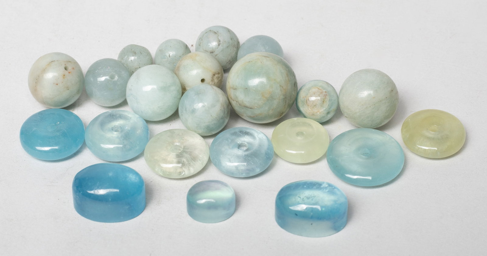 Set Aquamarine Cut Stones, Beads: Collection of aquamarine and stone carved beads and pebbles. Size varies.