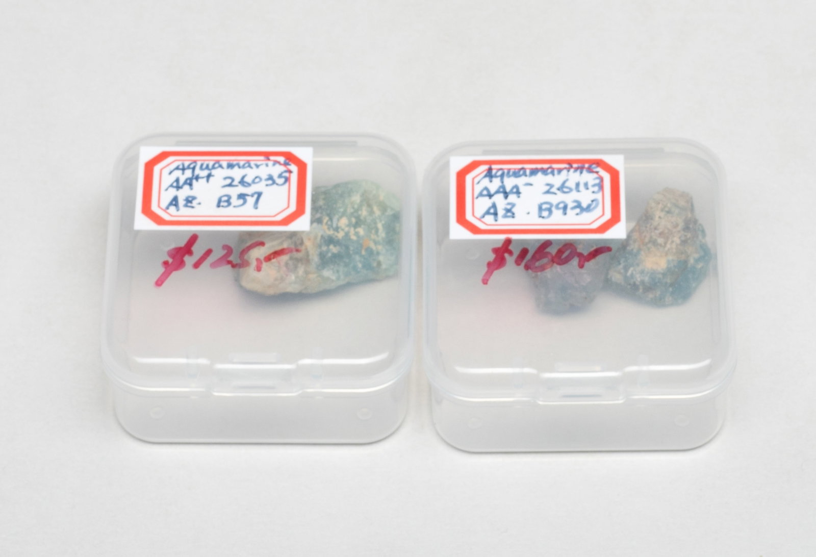 Three High Quality Aquamarine Stone Nuggets: Three high quality aquamarine stone nuggets, with two cases. Approx. 15.6 gram (total weight), 1*0.73*0.6 inch (largest).