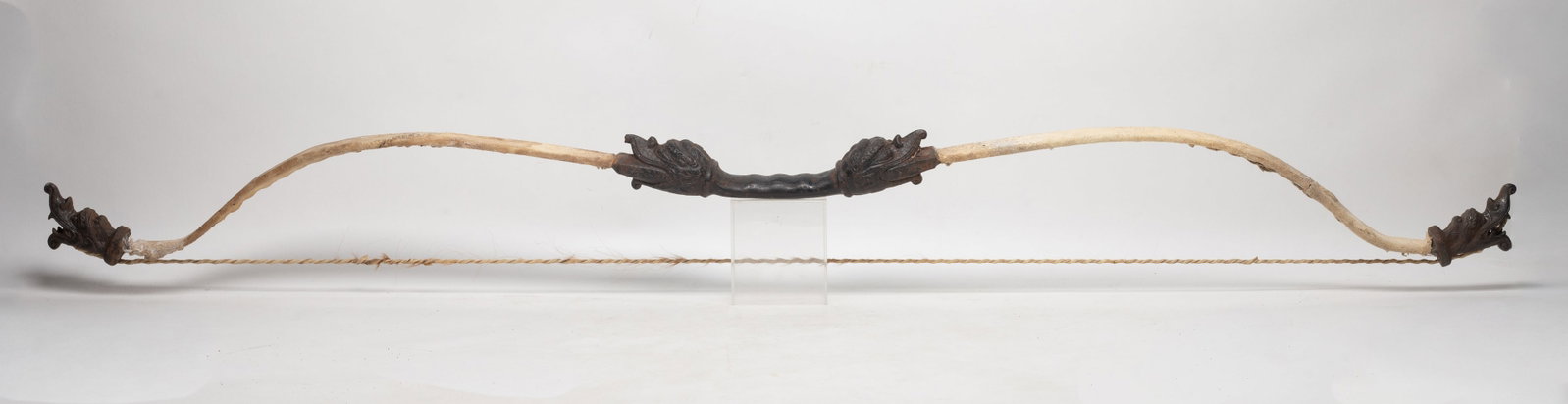 Estate Large Chinese Metal Bow: Large Chinese metal bow. Approx. 48.7 inch L.