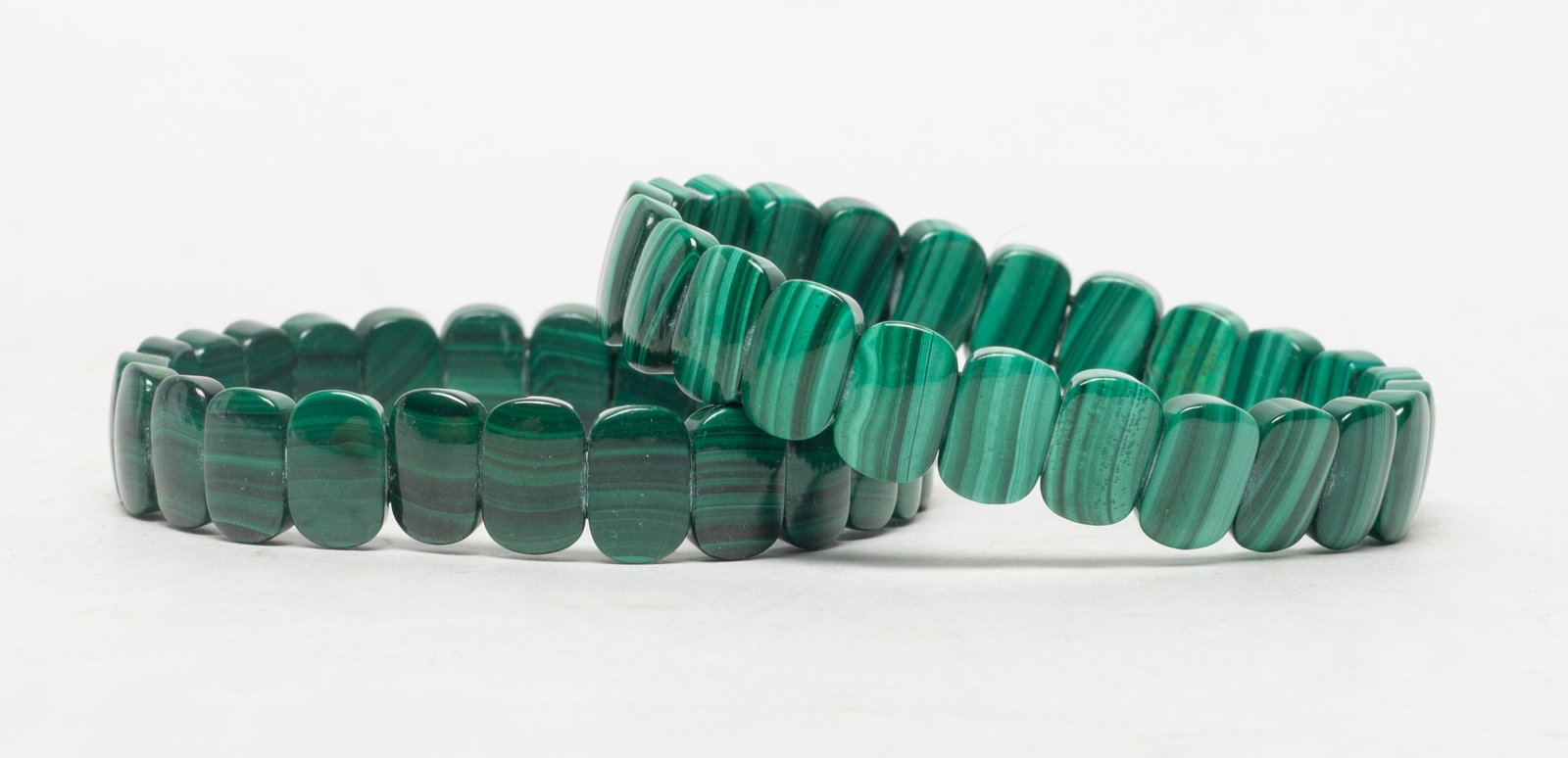 Two Vintage Malachite Bracelets: Two vintage malachite bead bracelets. Approx. 2.2 inch D (each).
