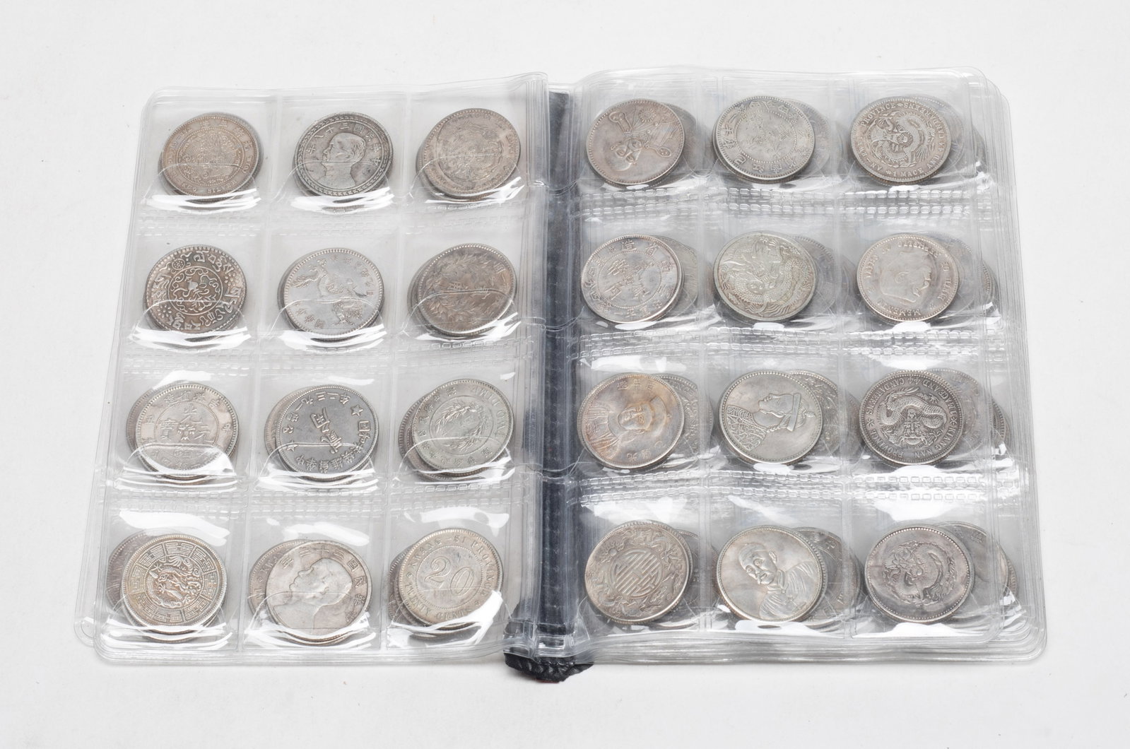 Estate Set Chinese Fengshui Coins Collection: Large set of Chinese Fengshui coins, with an album. Size varies.
