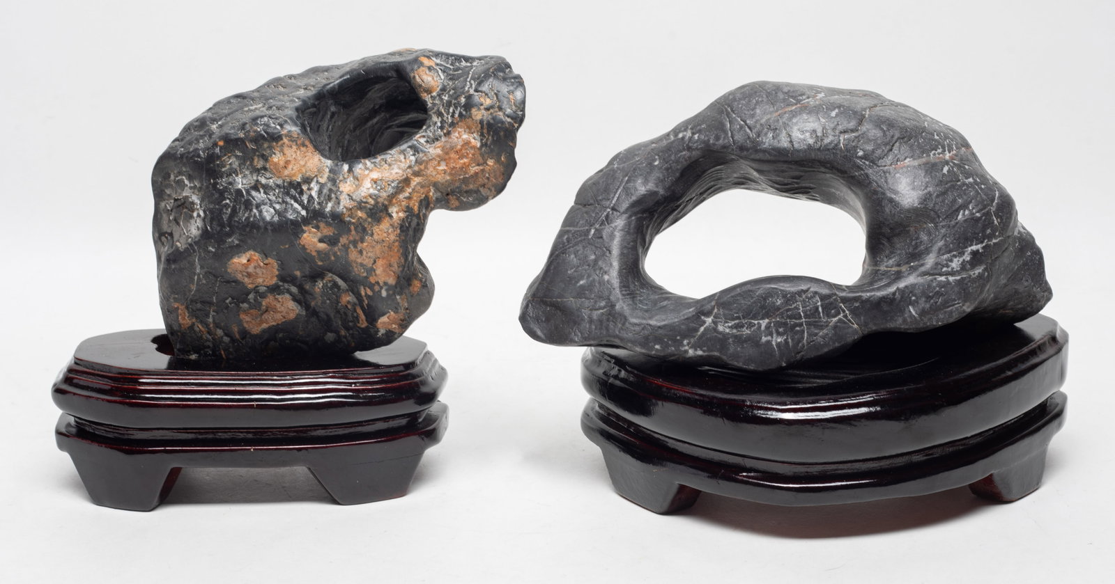 Two Chinese Scholar Stone Sculptures: Two Chinese scholar stone table sculptures, with stands. Approx. 8.3*5*3.2 inch (larger stone size).