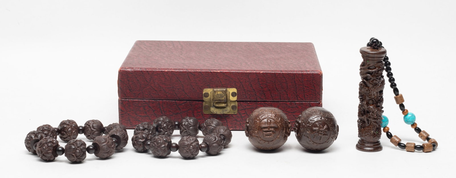 Set Asian Export Wood Carvings: Including two strings of prayer beads, two carved balls, and a pendant suspended on a string of beads, with box. Approx. 3.7*0.95 inch (pendant size).