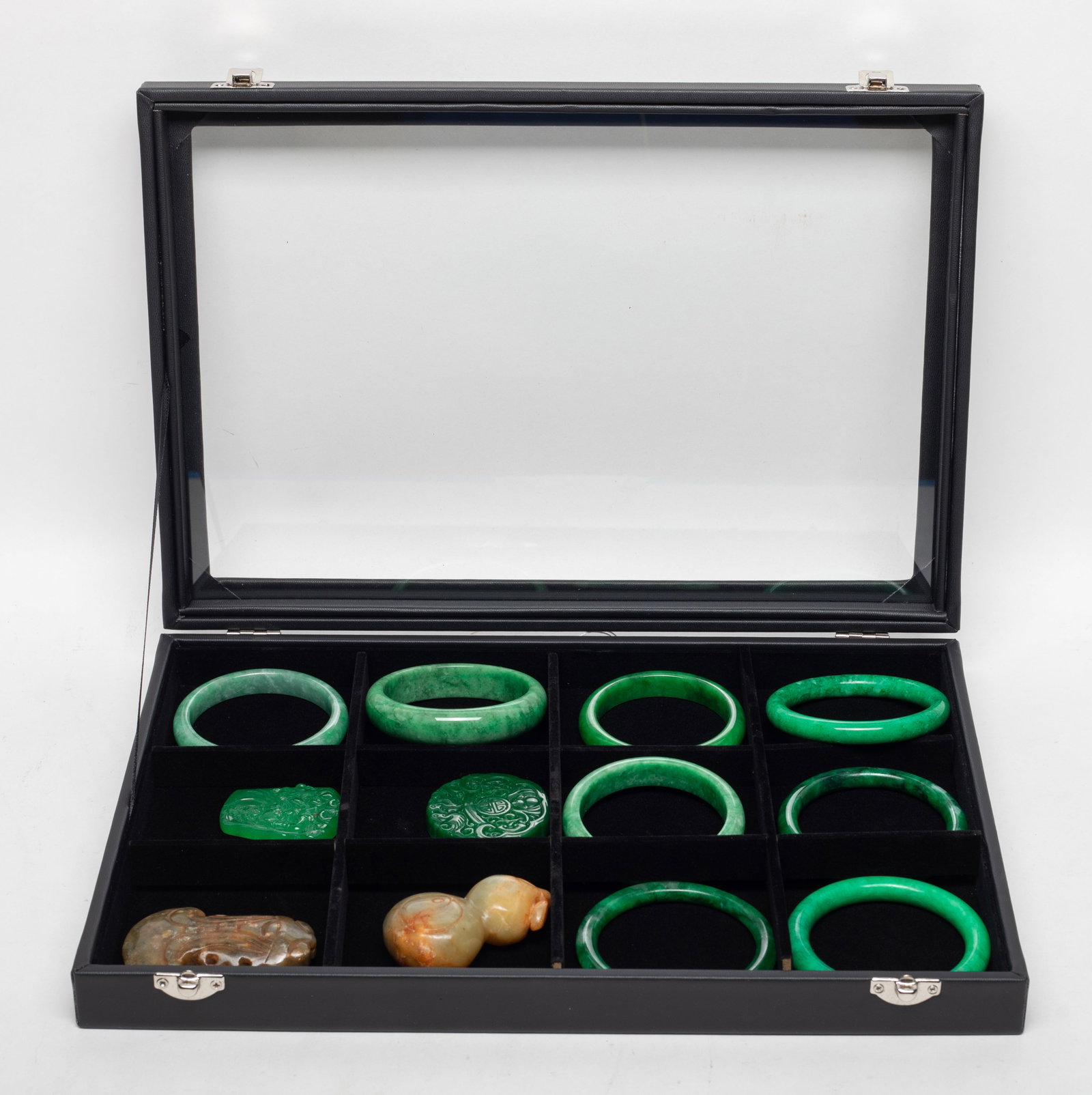 Estate Chinese Colored Stone, Glass Pieces: Including 8 colored stone bangles and 4 glass/colored stone carved pieces, with case. Approx. 3.1 inch outer diameter, 2.4 inch inner diameter (largest bangle).