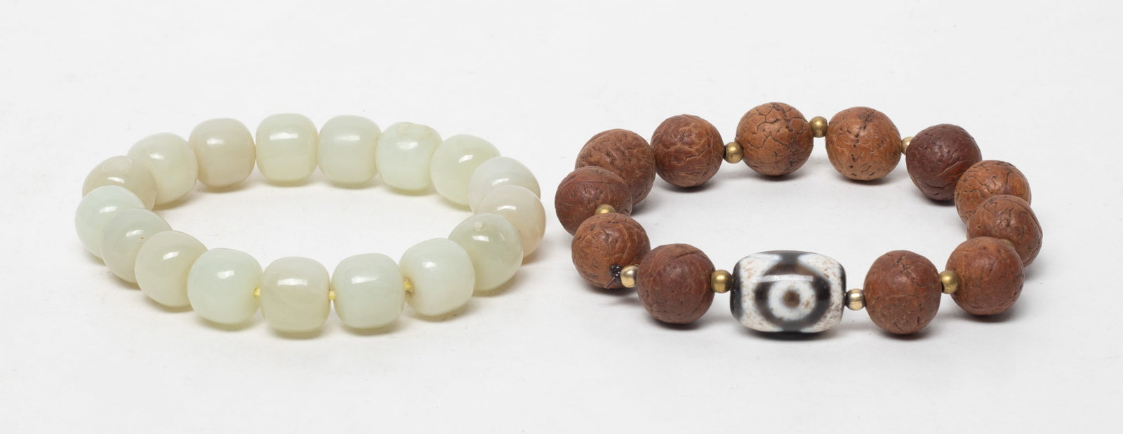 Estate Chinese Export Jade & Seed Prayer Beads: One string of jade prayer beads, and one string of seed prayer beads and an agate bead. Approx. 0.7*0.5 inch (largest bead).
