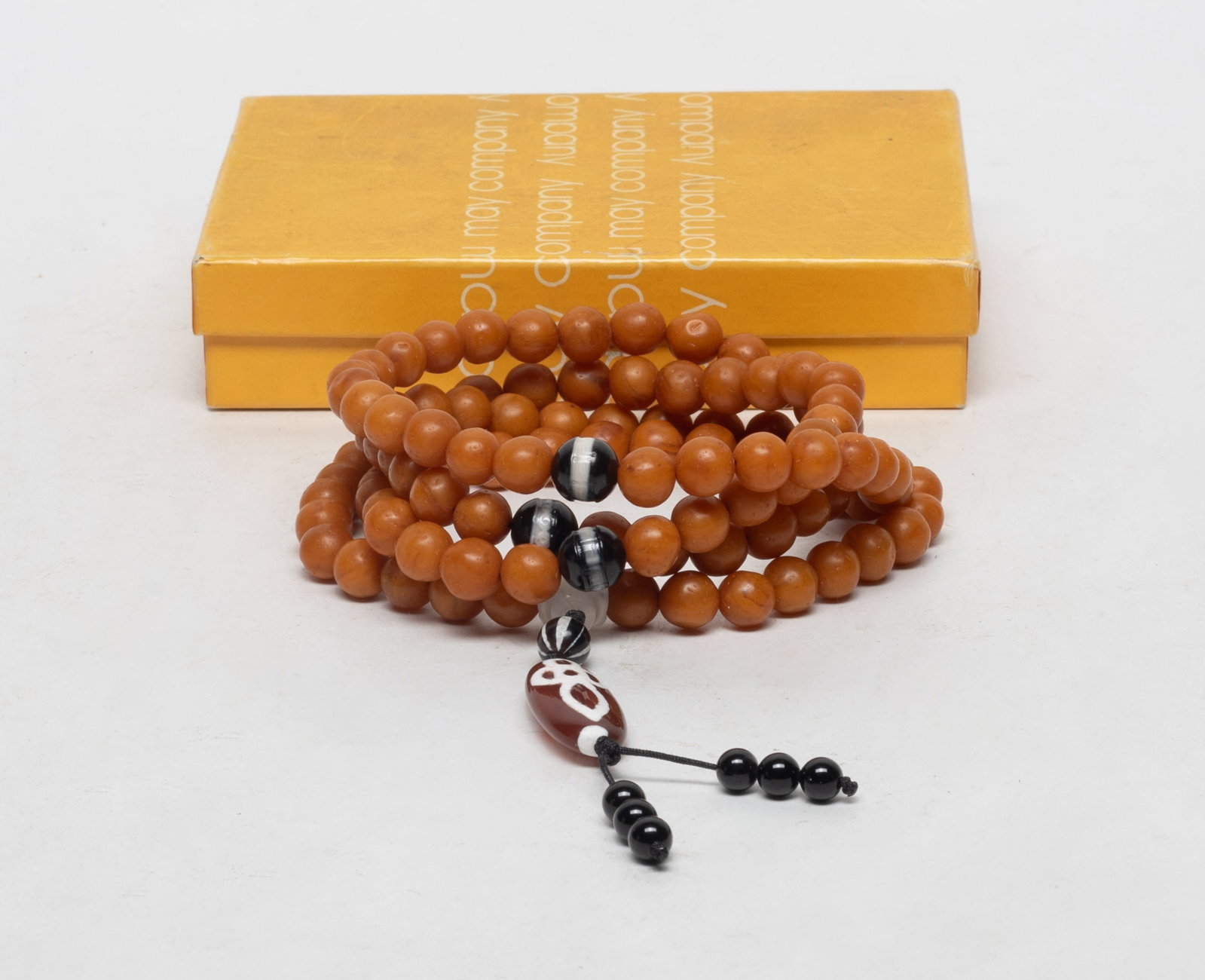 Estate Chinese Amber Prayer Beads: A long string of Chinese amber prayer beads, with box. Approx. 38 inch L.