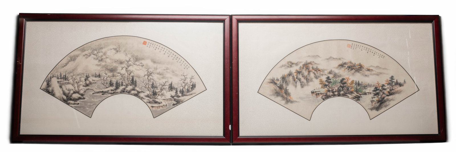 Two Vintage Chinese Water Color Paintings: Two vintage Chinese water color landscape scene painting in a fan-leaf format and displayed in a wood frame. Approx. 17.6*29 inch (with frame)