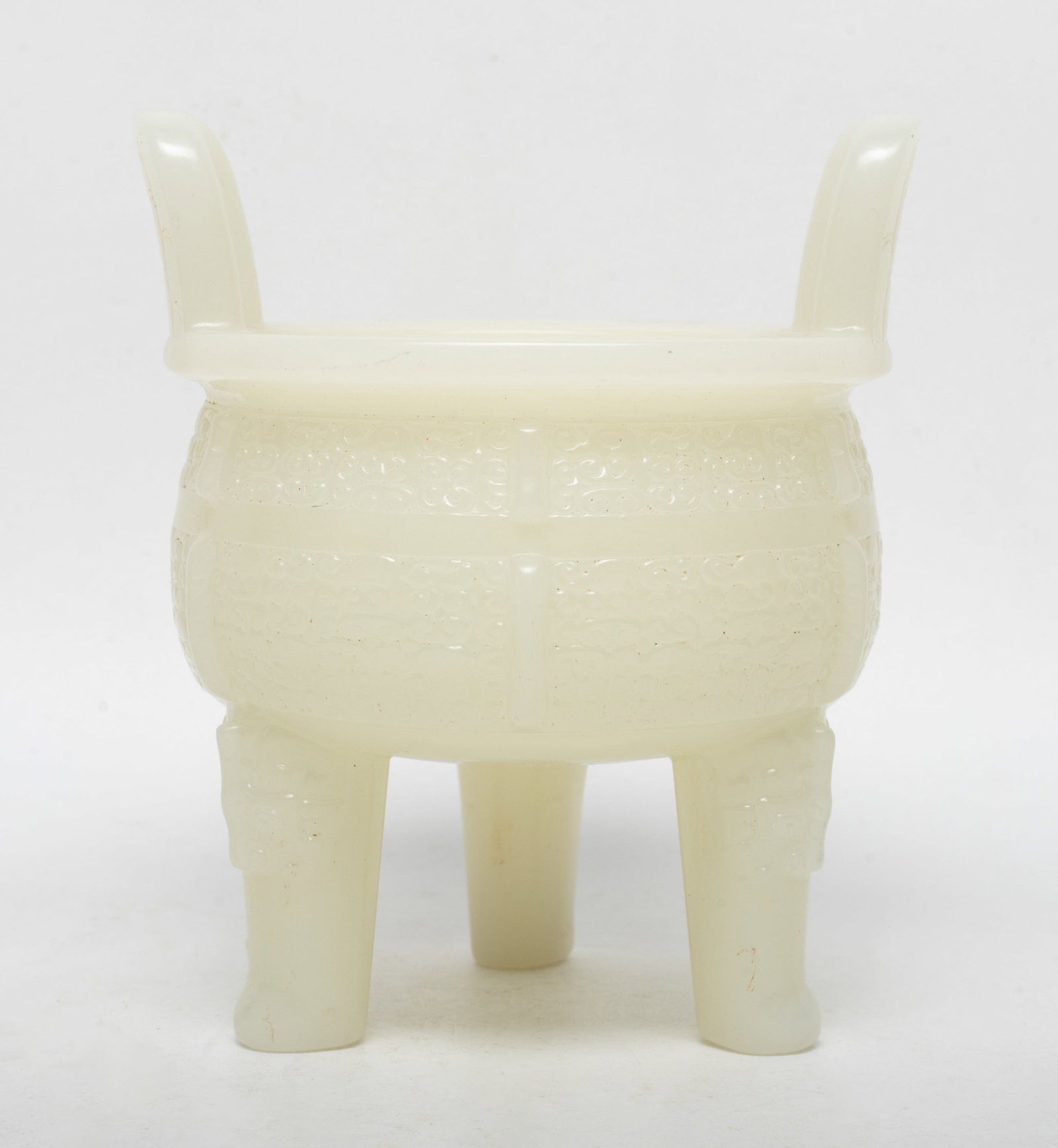 Chinese White Jade Like Censer: Chinese white jade-like censer carved archaic motif. Approx. 5*4 inch.