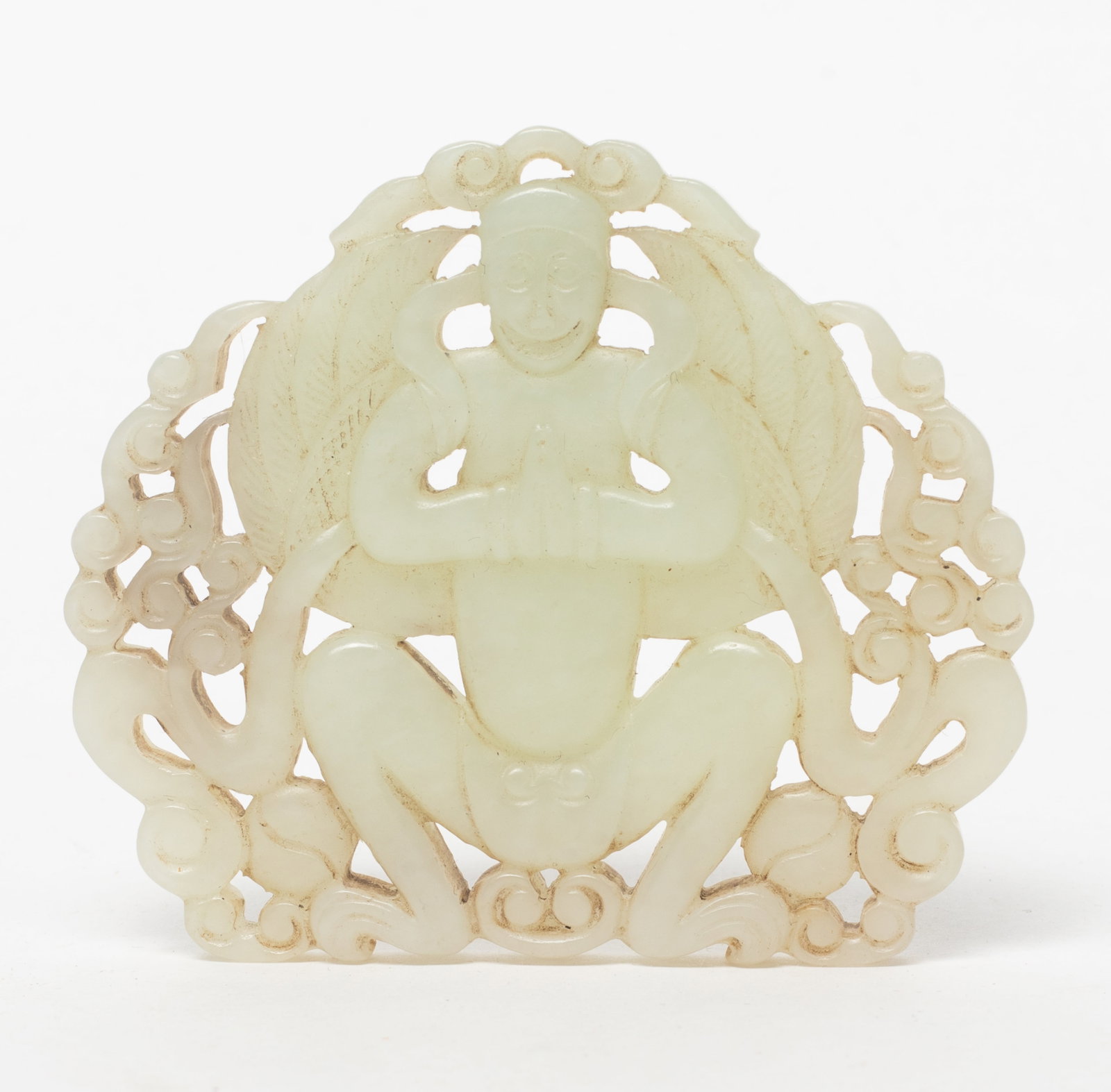 Chinese Export Jade Carved Pendant: Chinese jade plaque carved in openwork with stylized figure and scrolls. Approx. 2.8*2.45 inch.