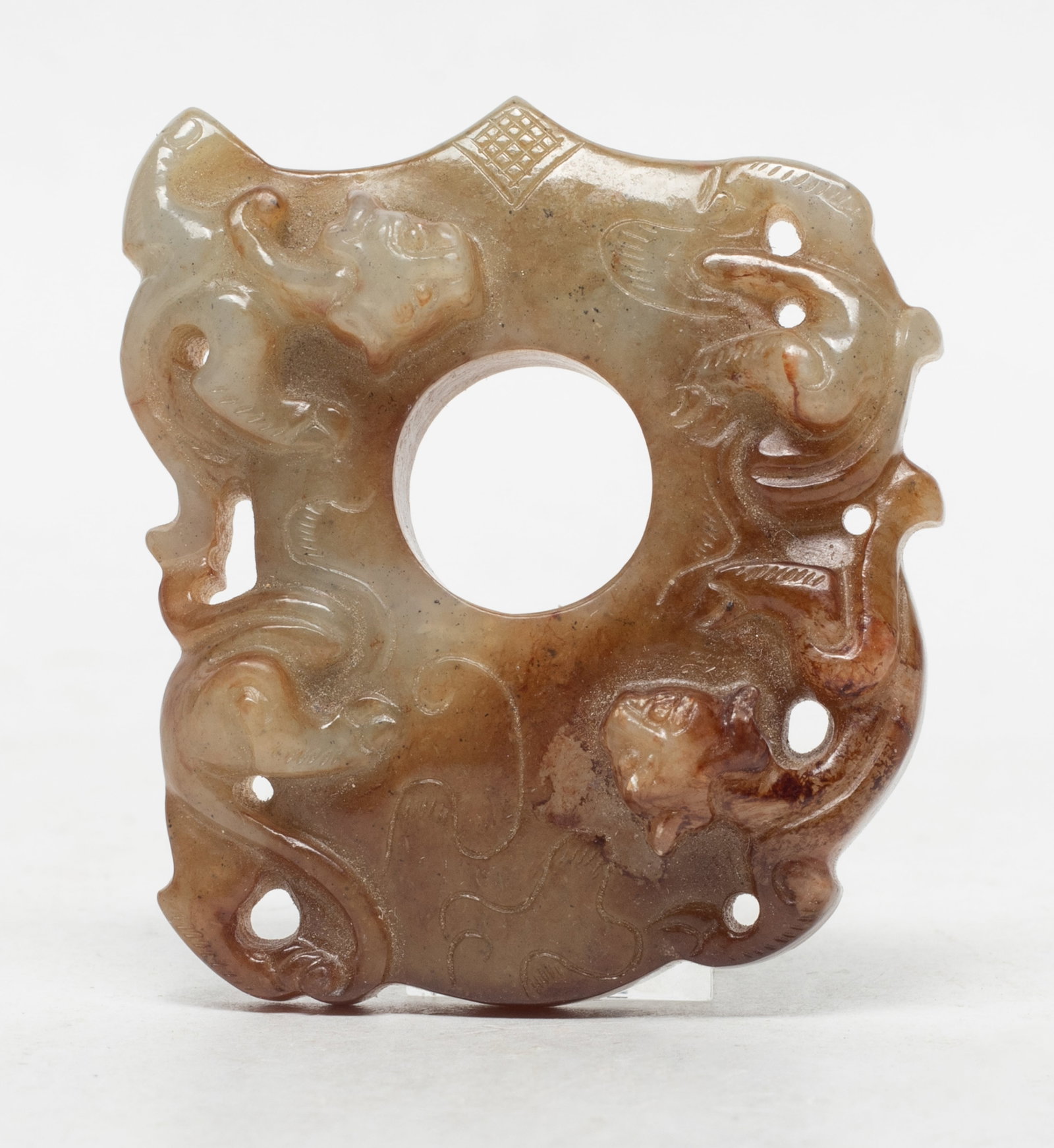 Estate Chinese Russet Jade Pendant: Chinese russet jade pendant carved in high relief with chi dragons. Approx. 2.1*1.9*0.6 inch.