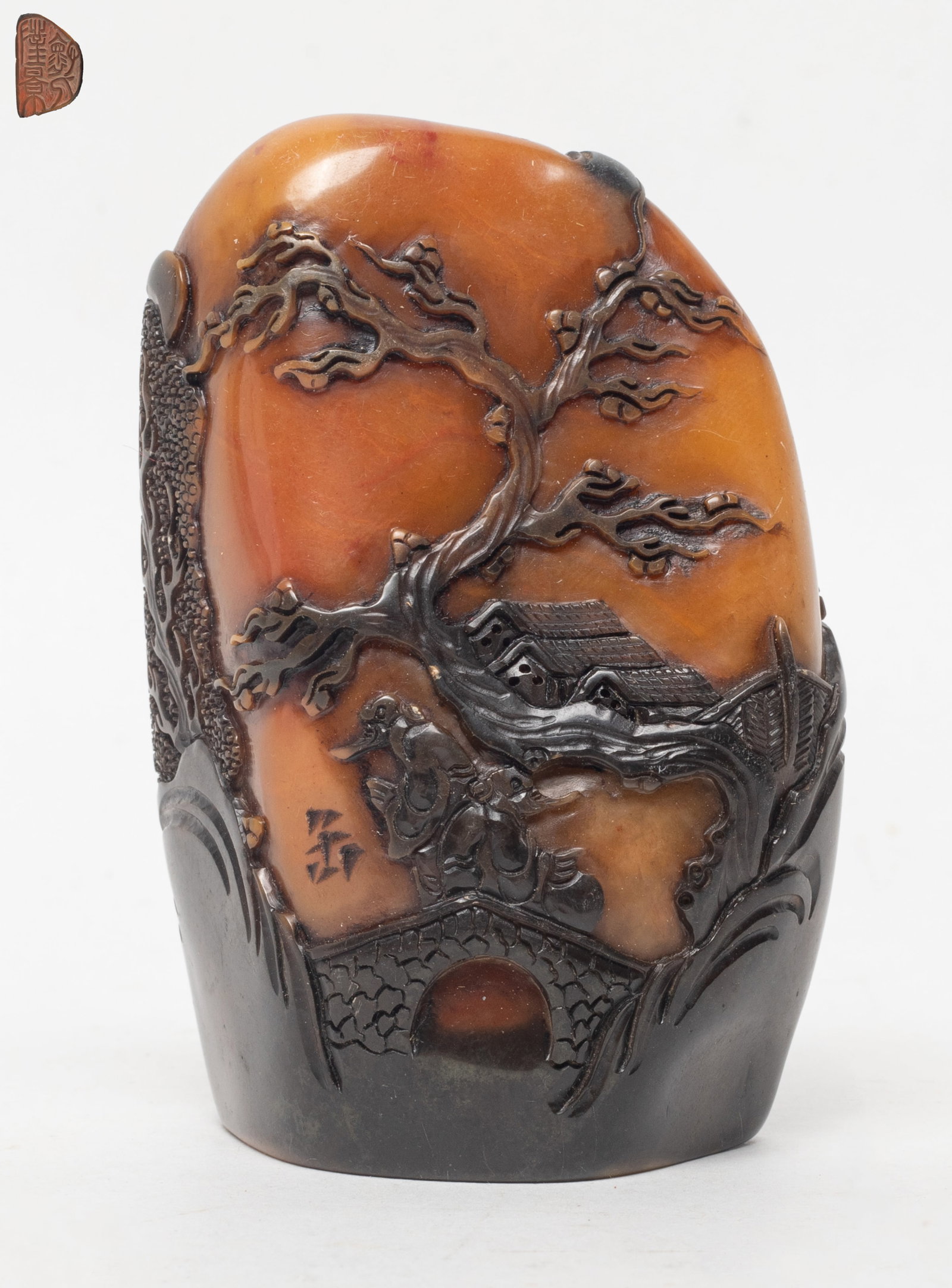 Chinese Russet Skin Stone Seal: Chinese russet skin stone seal carved with landscape scene. Approx. 3.05*2.1*1.2 inch.