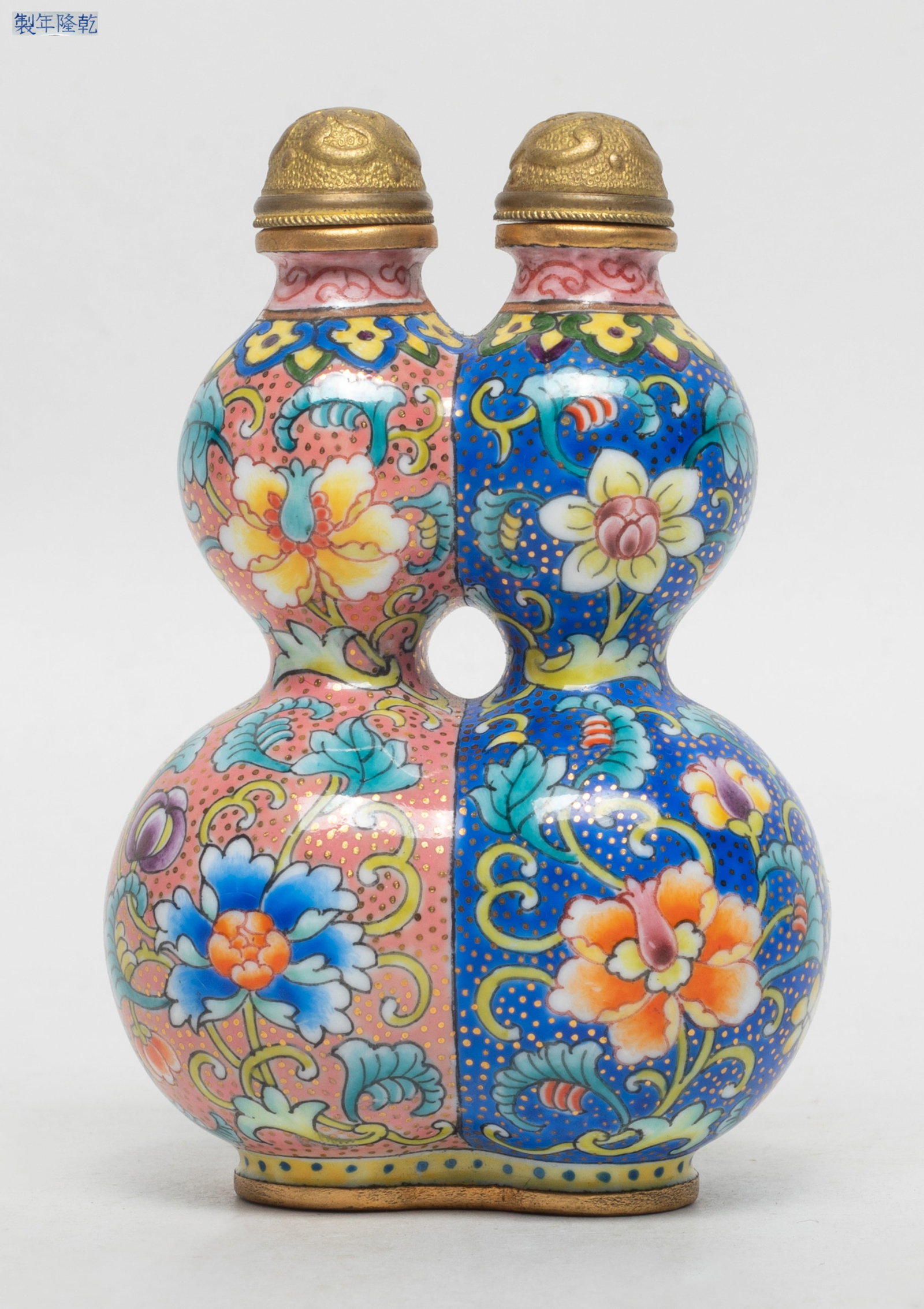 Estate Chinese Enameled on Brass Snuff Bottle: Of twin gourd form enameled with lotus foliage, marked four characters to bottom. Approx. 3.3*2.2*1.53 inch.