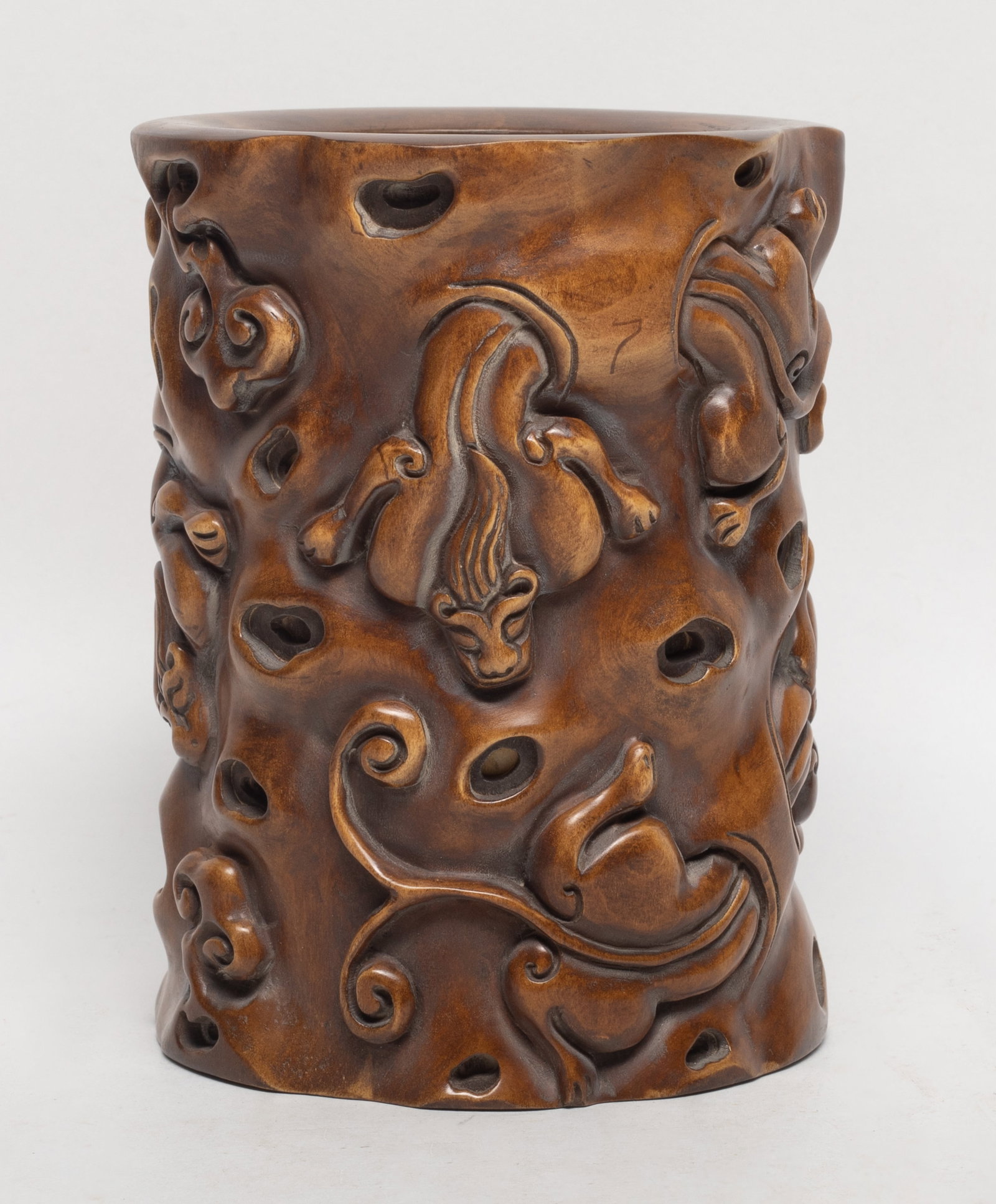 Chinese Box Wood Carved Brush Pot: Chinese boxwood brush pot carved in relief with beasts and lingzhi. Approx. 5.1*4 inch.