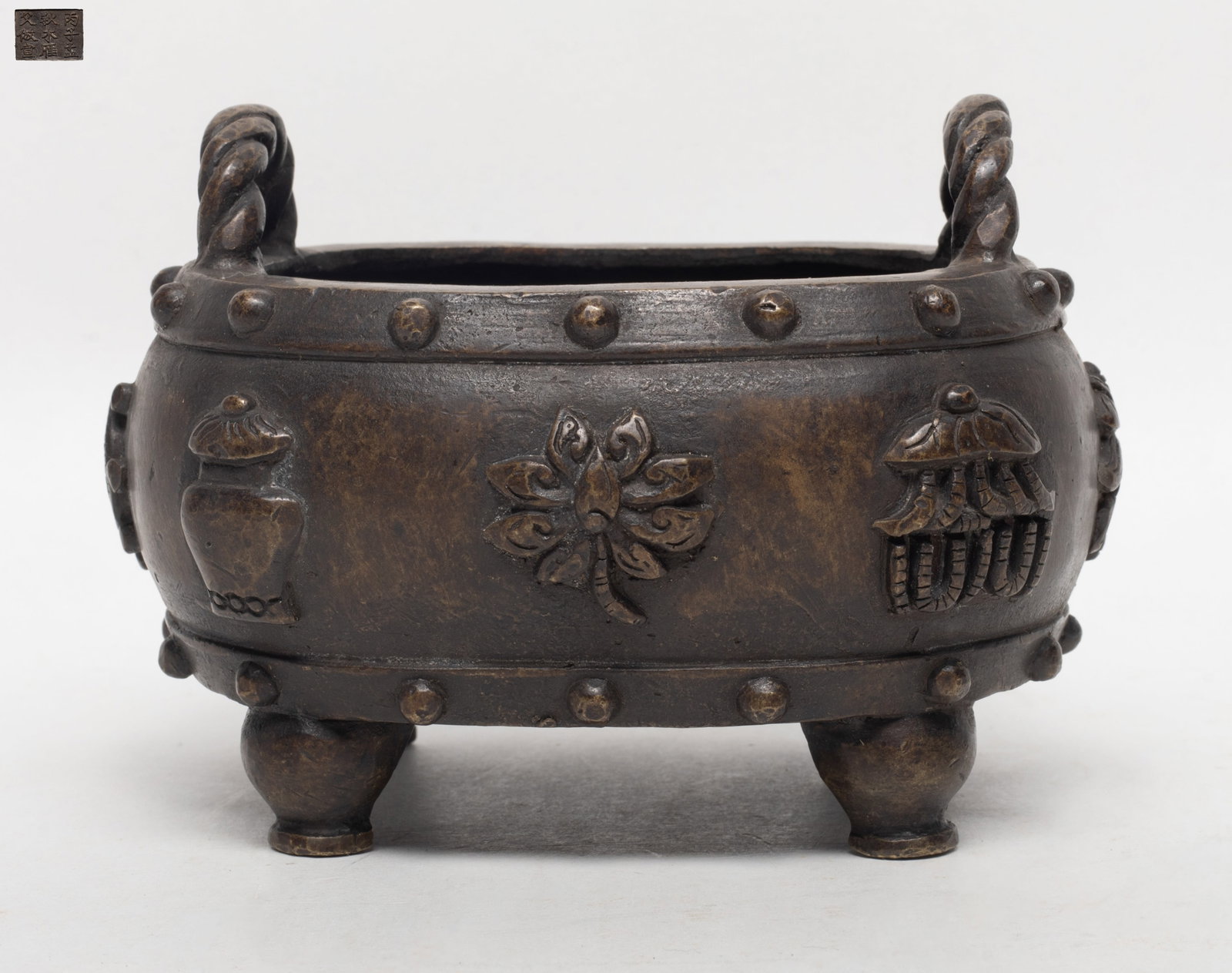 Estate Chinese Bronze Cabinet Censer: Chinese bronze cabinet censer cast with Buddhist treasures, marked nine characters to underside. Approx. 5.5*4.7*3.8 inch.