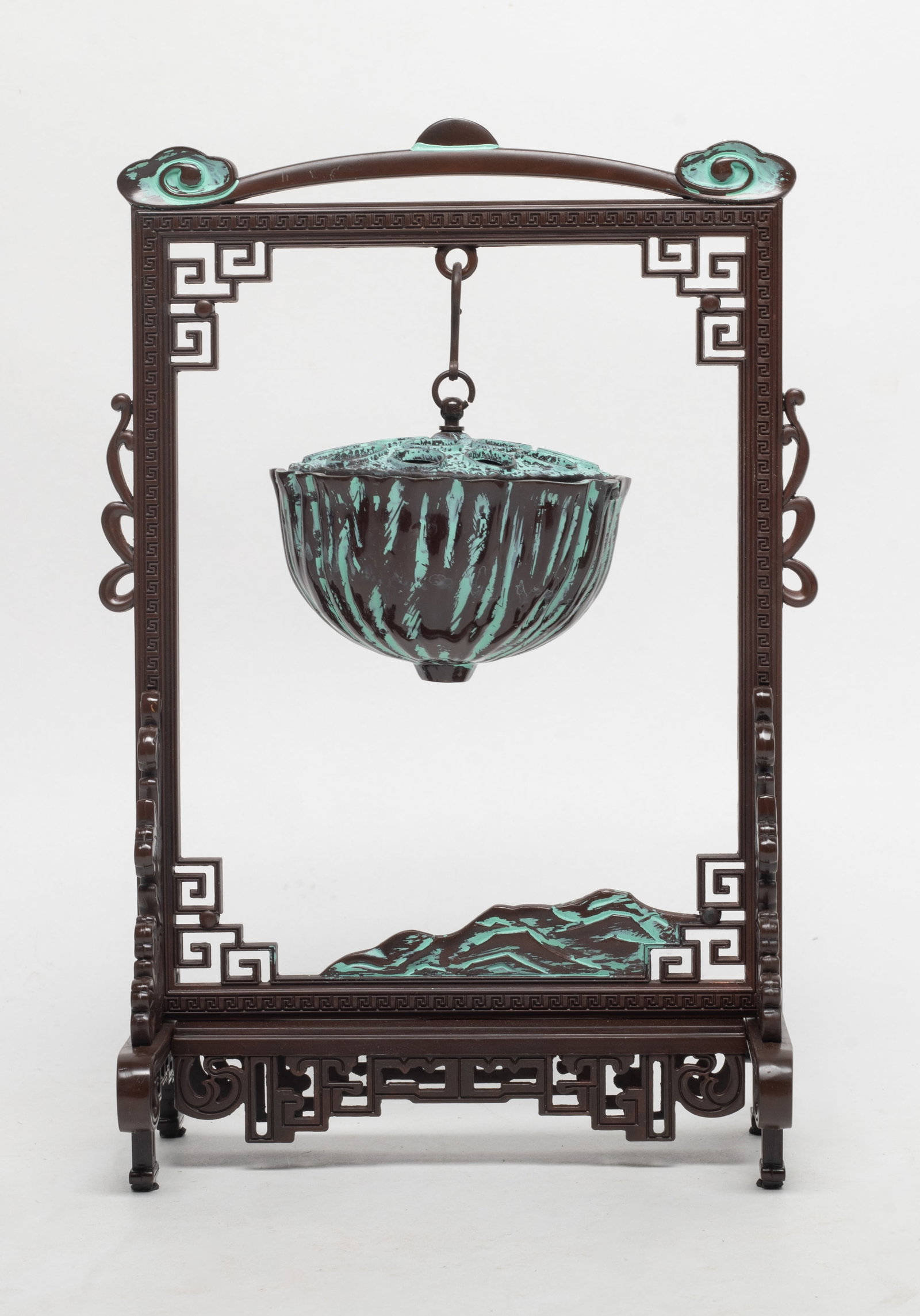 Designed Bronze Incense Burner: Chinese bronze lotus seedpod form incense burner, suspended on stand. Approx. 9.6*6*3.8 inch (stand size).