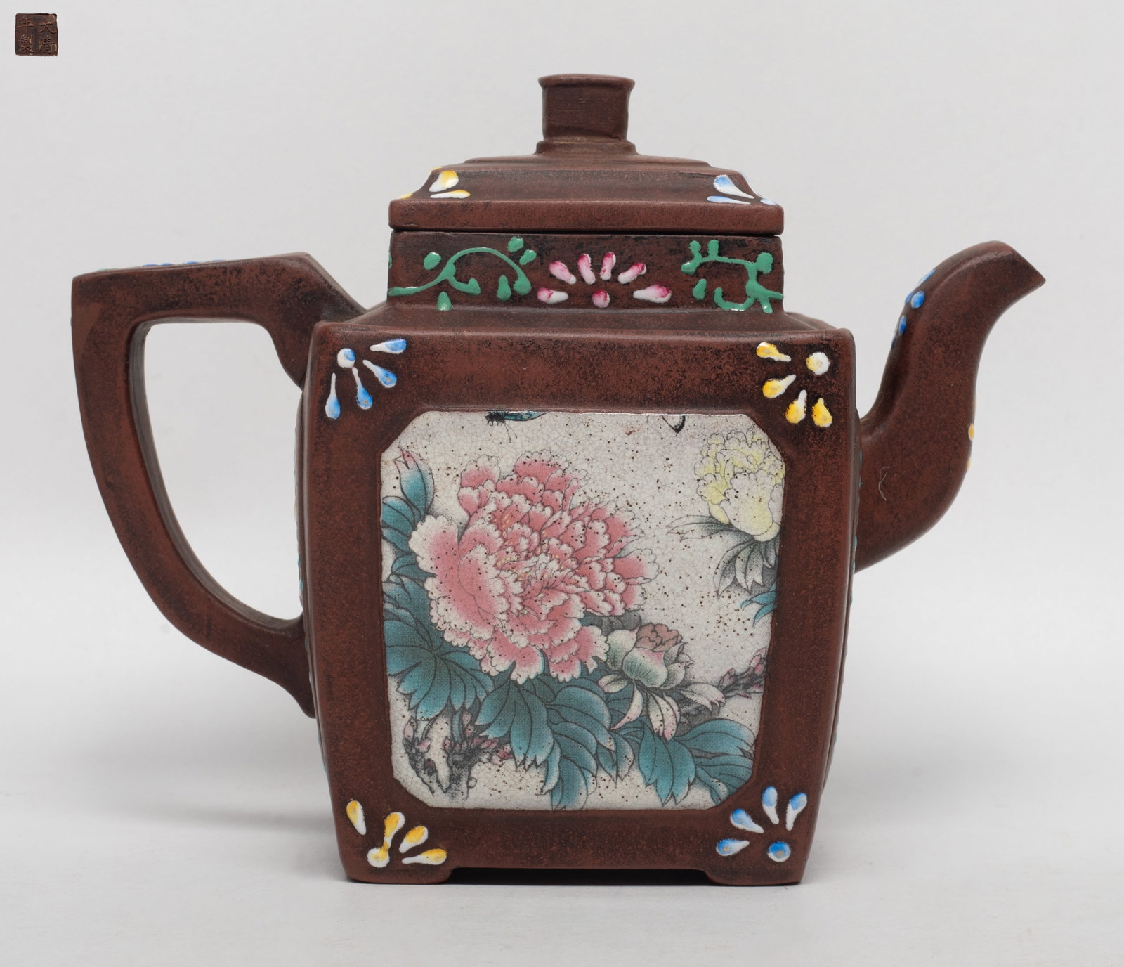 Chinese Enameled on Zisha Tea Pot: Chines zisha tea pot enameled with playing boys and flowers, the bottom incised a seal mark. Approx. 6.4*5.1*3.7 inch.
