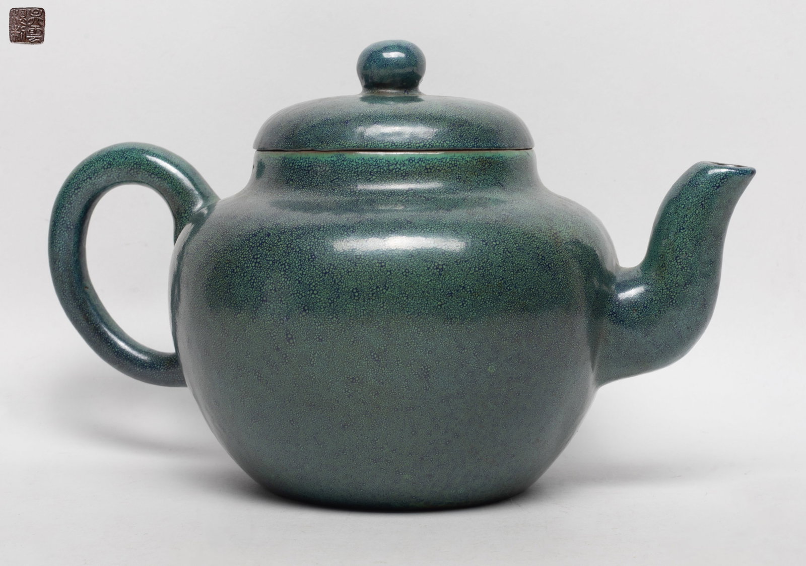 Large Chinese Glazed Zisha Tea Pot: Large Chinese glazed zisha tea pot, the bottom incised with a seal mark. Approx. 9.7*6*6 inch.