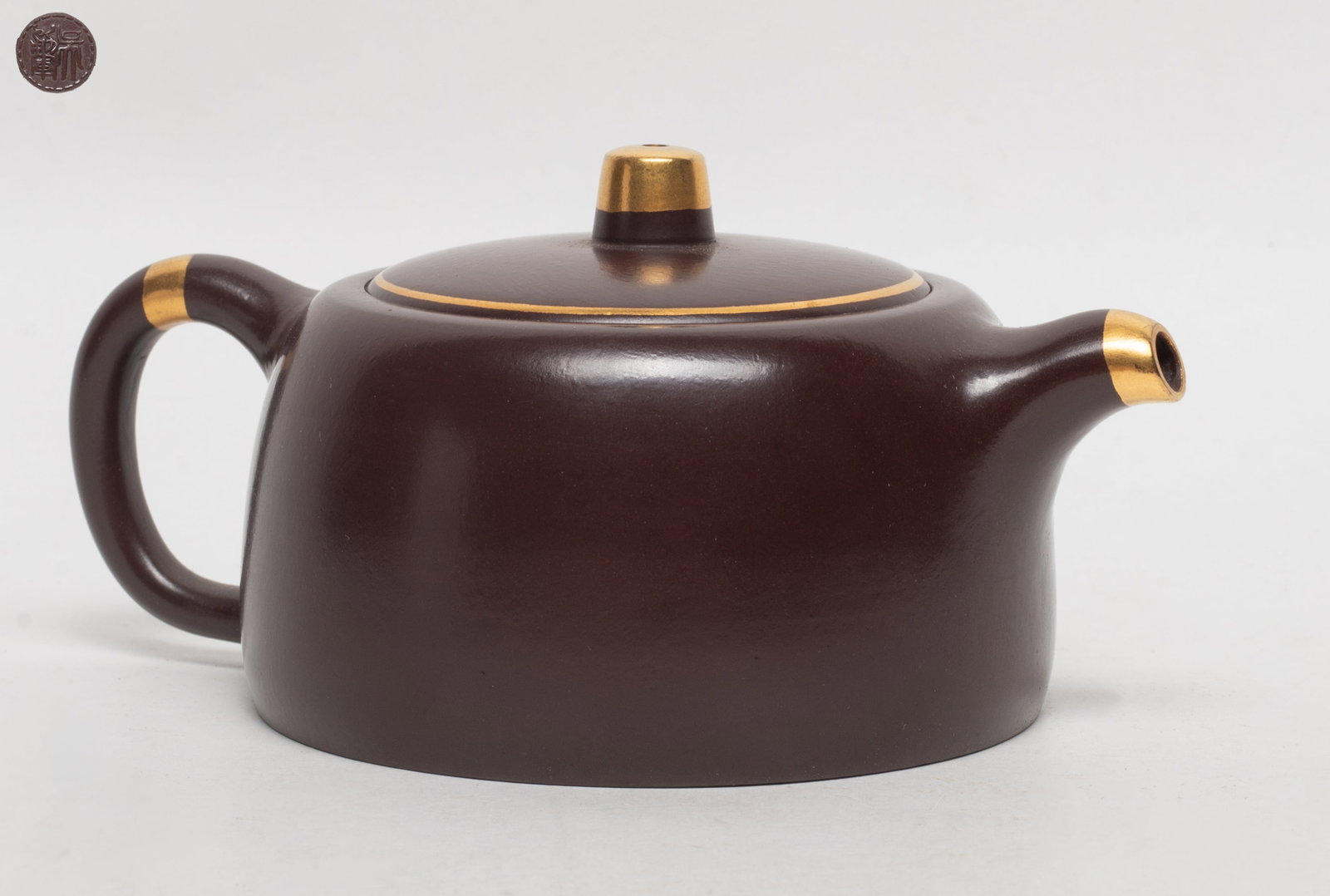 Chinese Gold on Zisha Tea Pot: Chinese gold on zisha tea pot, the lid interior with two marks and the bottom with a mark. Approx. 5*3.4*2.4 inch.
