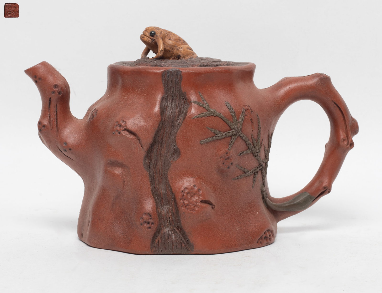 Chinese Export Yixing Zisha Tea Pot: Chinese Yixing zisha tea pot of trunk form, the lid with a frog finial, incised seal mark to underside. Approx. 7*4.3*4.1 inch.