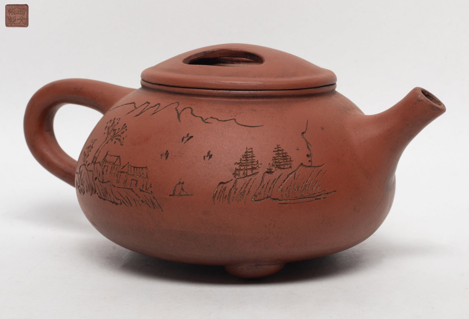 Estate Chinese Yixing Zisha Tea Pot: Chinese Yixing zisha tea pot, incised with a seal mark on the bottom. Approx. 7*5*3.2 inch.
