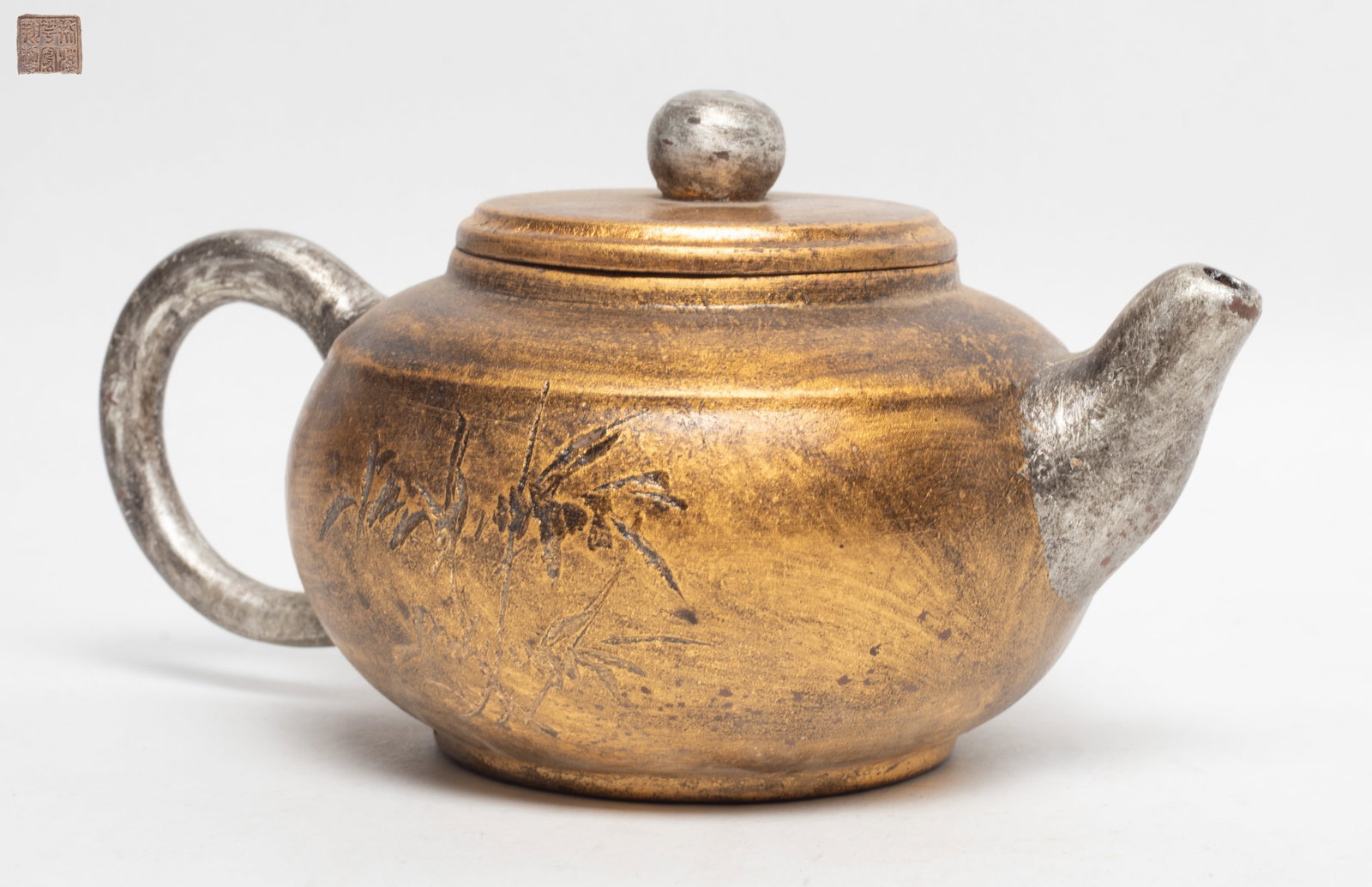Gold Color Chinese Export Yixing Zisha Tea Pot: Chinese gold-colored Yixing zisha tea pot, incised seal mark to underside. 7*4.7*3.7 inch.