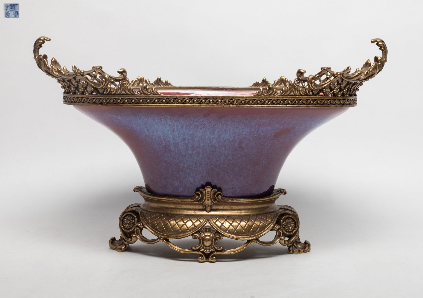 Chinese Export Porcelain Center Piece: Chinese flambe glazed porcelain centerpiece, with metal mouthrim and foot, marked six characters to underside. Approx. 15.7*8.3*9.5 inch.