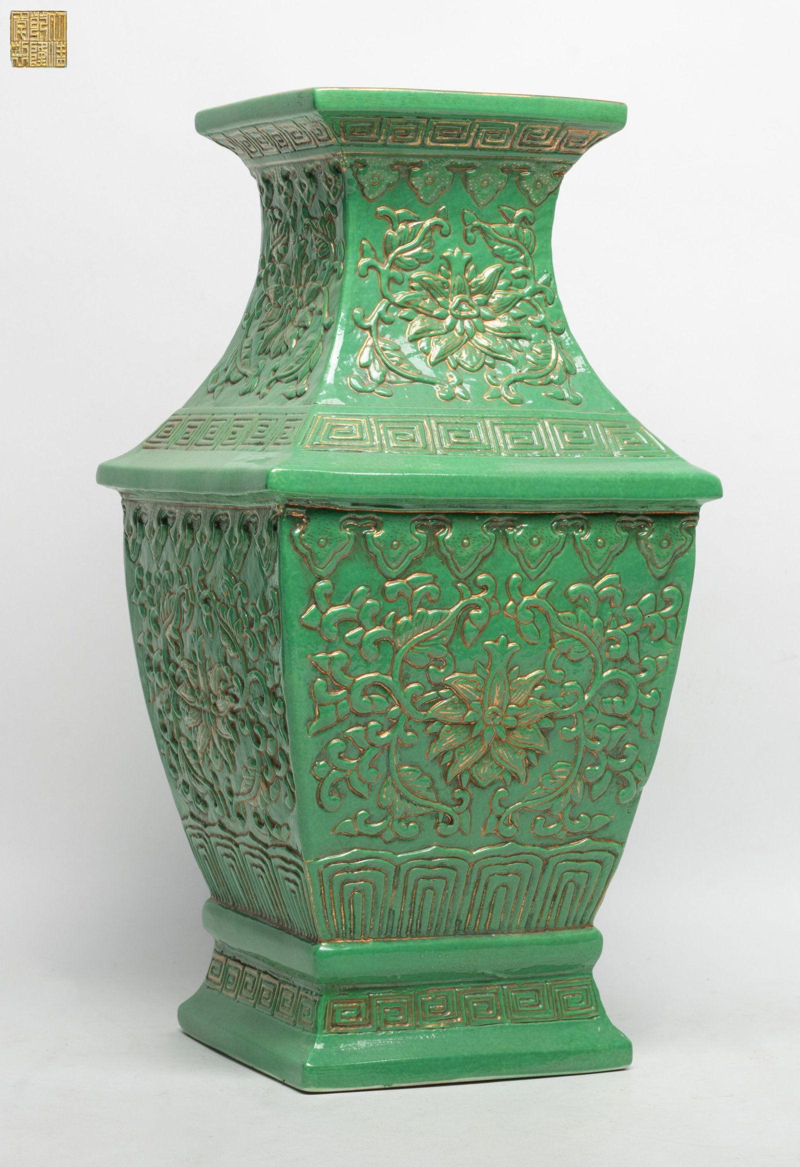 Tall Chinese Turquoise Glazed Porcelain Vase: Chinese turquoise-green glazed porcelain vase carved lotus foliage, incised six character mark to underside. Approx. 14.5*7.2*7.2 inch.