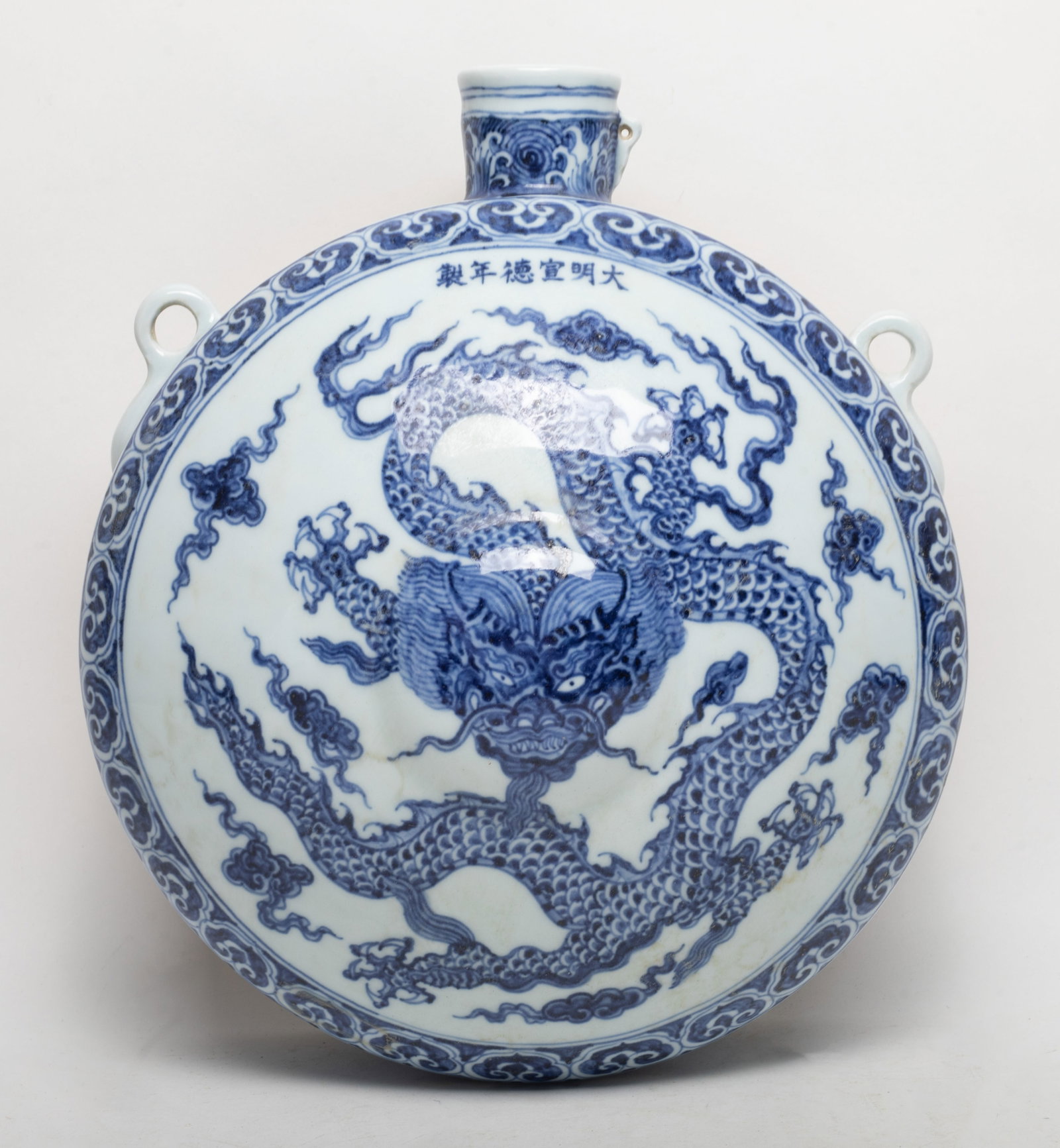 Chinese Export Porcelain Hanging Vase: Chinese blue and white porcelain hanging vase, painted with dragon among clouds, marked with six characters. Approx. 11.7*10.2*5.2 inch.