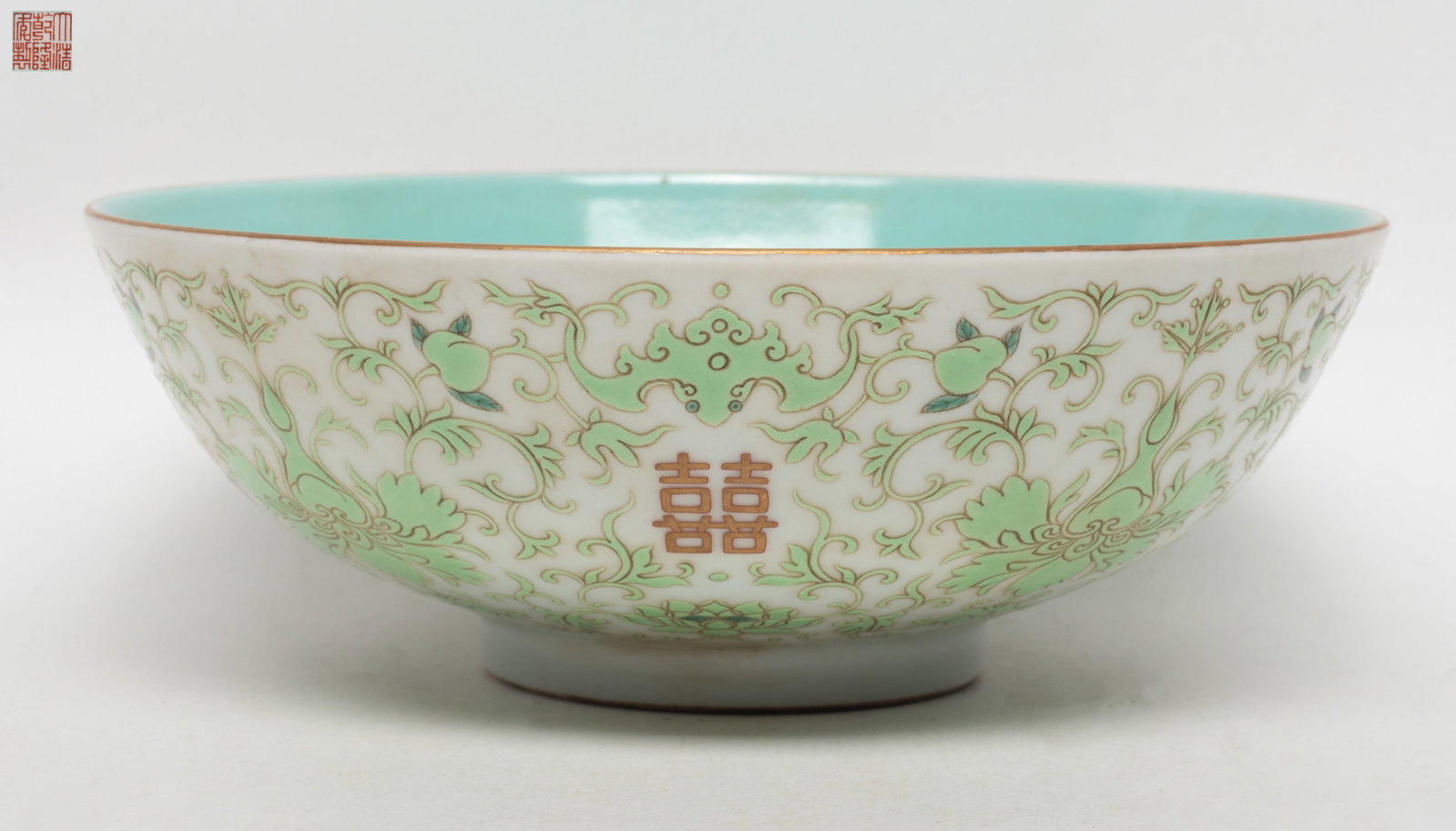 Collectible Chinese Export Porcelain Bowl: Chinese porcelain bowl enameled with lotus, peach and bat in soft green color, marked six characters to bottom. Approx. 6.6*2.4 inch.