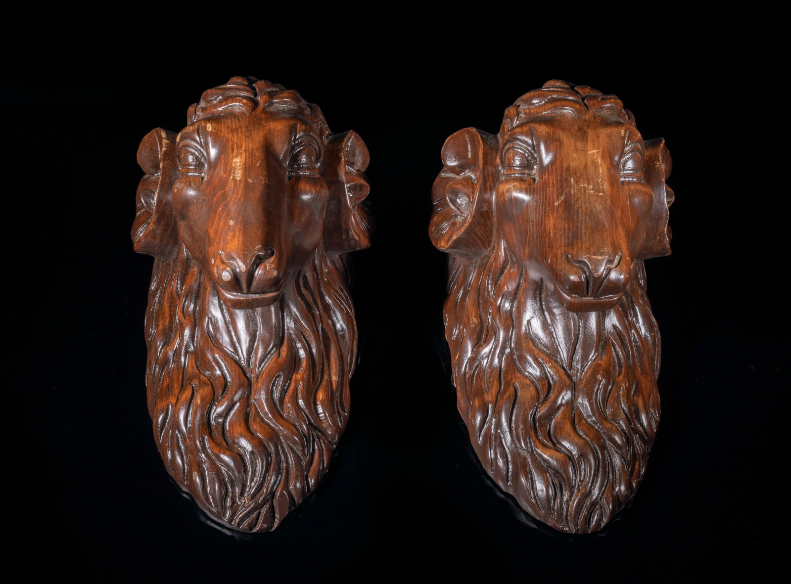 Two Wood Ram Cornice Shelf: Two wood carved ram head form cornices. Approx. 13*7.5*7 inch (each).