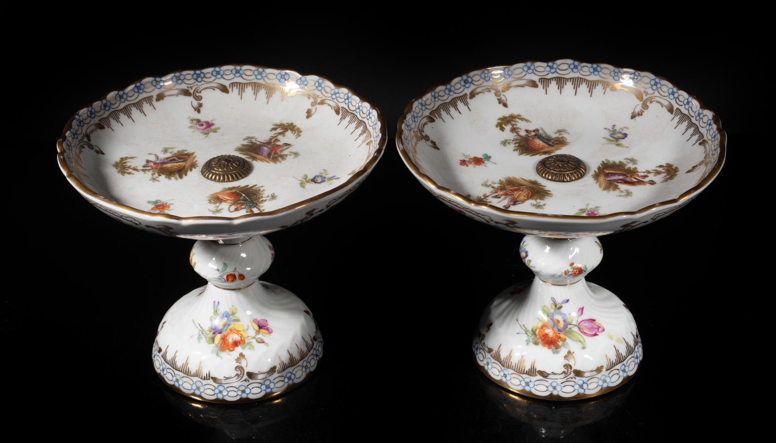 Two Antique Continental Porcelain Tall Plates: Two antique continental porcelain tall plates decorated with flowers and figures. Approx. 6.5*5.2 inch (each).