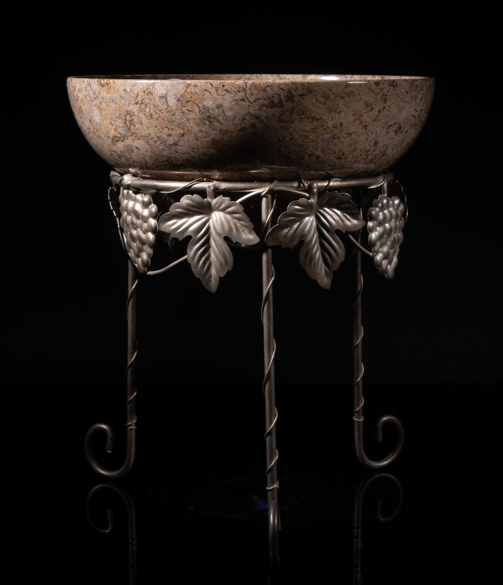 Large Vintage Fossilized Stone Bowl: Large collectible fossilized stone carved bowl, the surface finely smoothed, with a tall stand molded with grapes and leaves. Approx. 9.8*3 inch (w/o stand). The Estate of the Estate Sale in
