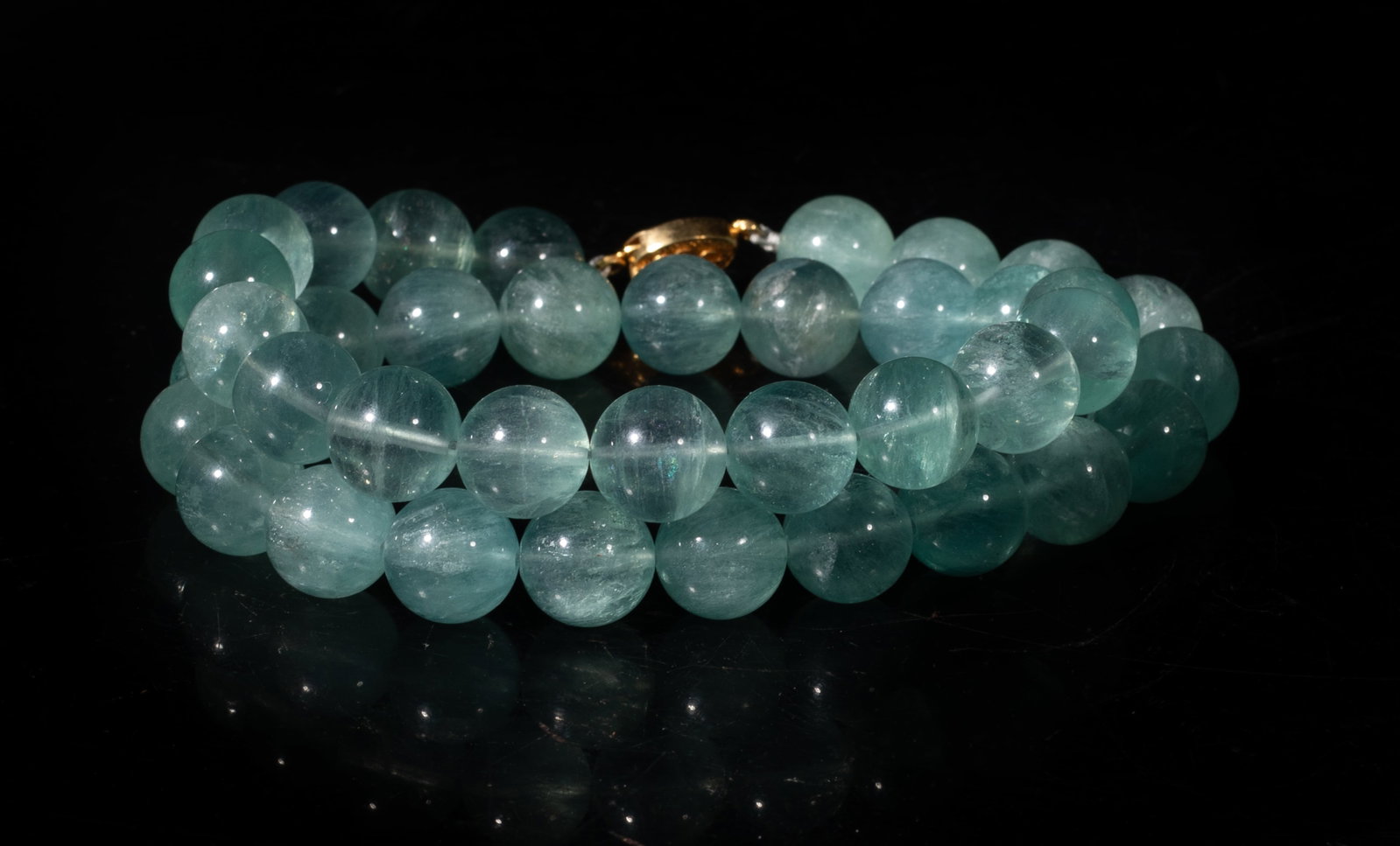 High Quality Chinese Aquamarine Necklace: Chinese high quality aquamarine carved bead necklace. Approx. 19 inch L.