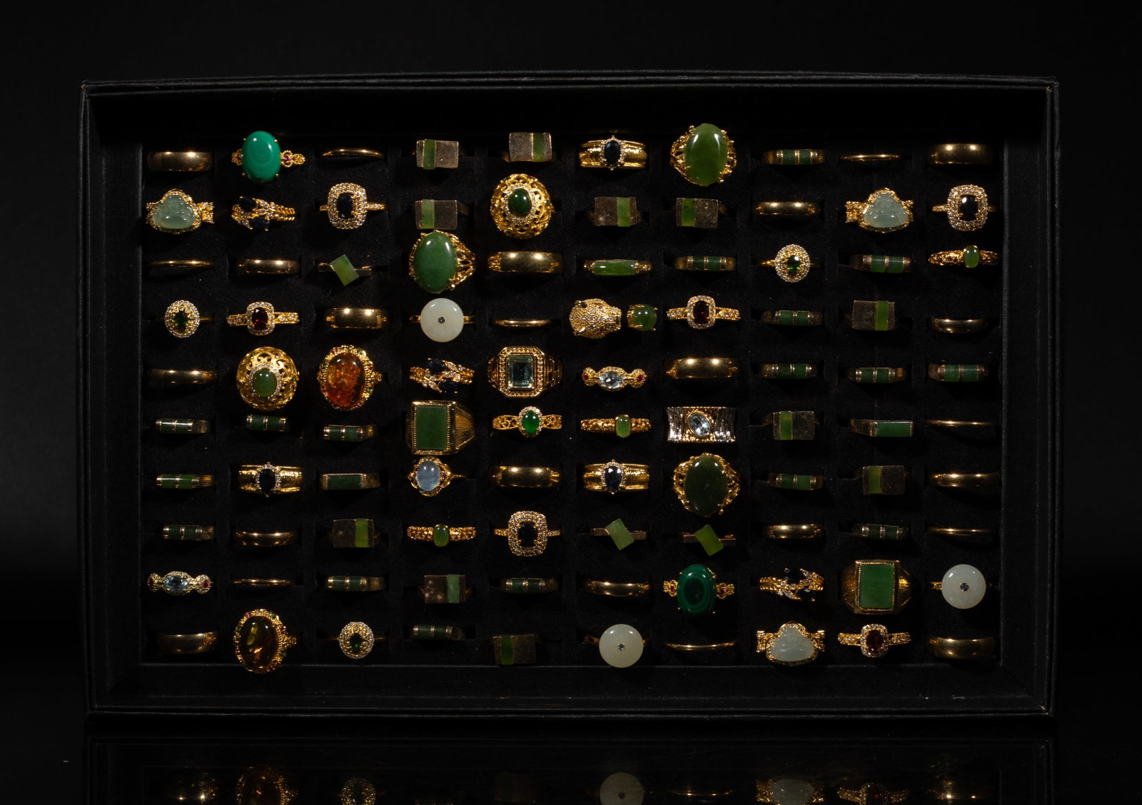 Chinese Gold Plated, Jade, Stone Rings: Large set of Chinese gold plated rings decorated with jade and stone, with tray. Size varies.