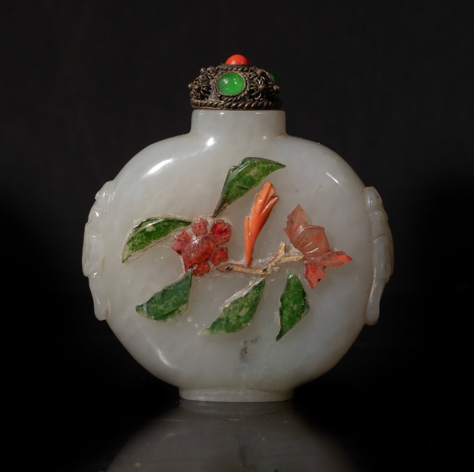 Antique Chinese White Jade Snuff Bottle: Chinese antique white jade snuff bottle, the front decorated with flower pattern, with a stopper. Approx. 2.17*2.01 inch (with stopper)