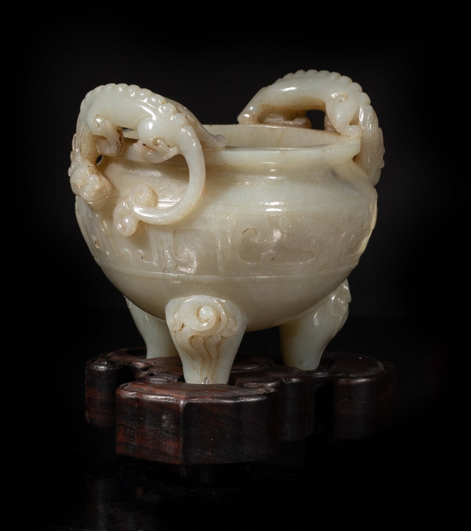 Unusual Chinese Jade Carved Cabinet Censer: Chinese jade cabinet censer carved with two beast handles, with wood stand. Approx. 3.1*2.8*2.7 inch (w/o stand). The Estate of the Jen & Son. Newport Beach. 2001.