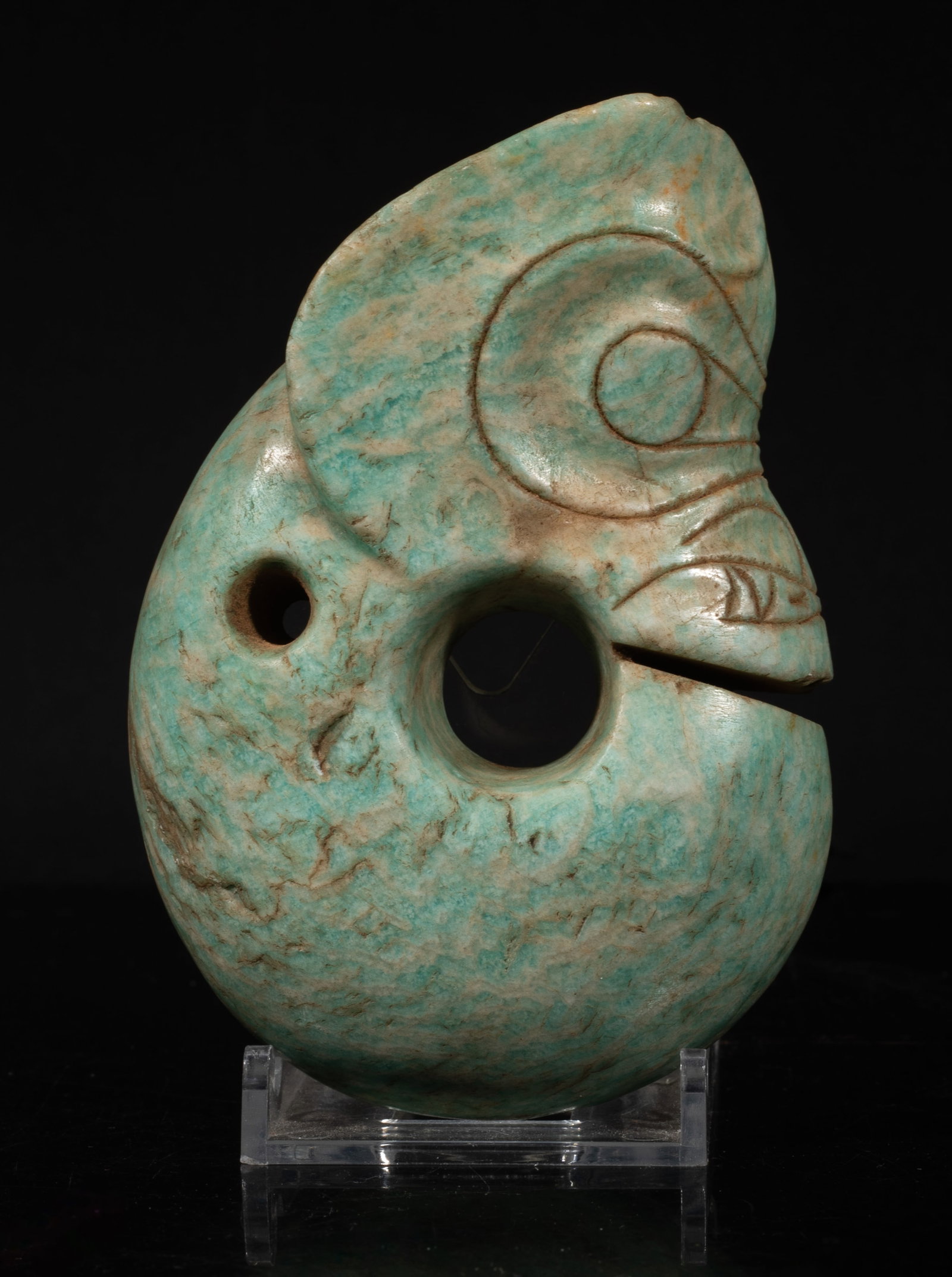 Estate Chinese Stone Carved Pendant: Large Chinese stone pendant carved of archaic pig-dragon form. Approx. 4.4*3*1.3 inch. The Estate of Kuo & Lee Art. HK. 1986.