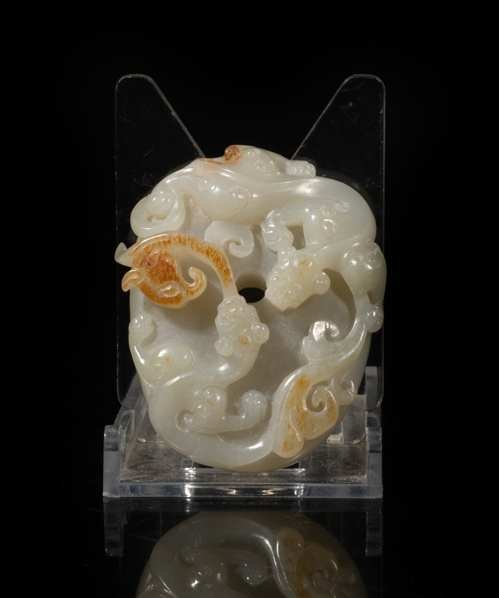 Rare Chinese Russet Jade Pendant: Chinese russet jade pendant carved in high relief with chi dragons. Approx. 2.45*1.97*0.65 inch.