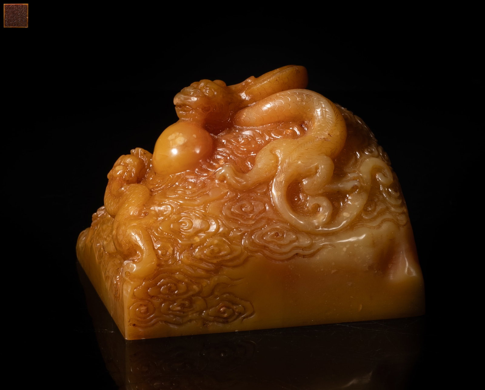 Chinese Shoushan Stone Carved Large Seal: Chinese large Shoushan stone seal carved with dragons sinuous amidst clouds. Approx. 3.8*3.73*2.85 inch. The Estate of the Jenny Park. Little Tokyo. Los Angeles. 1992.