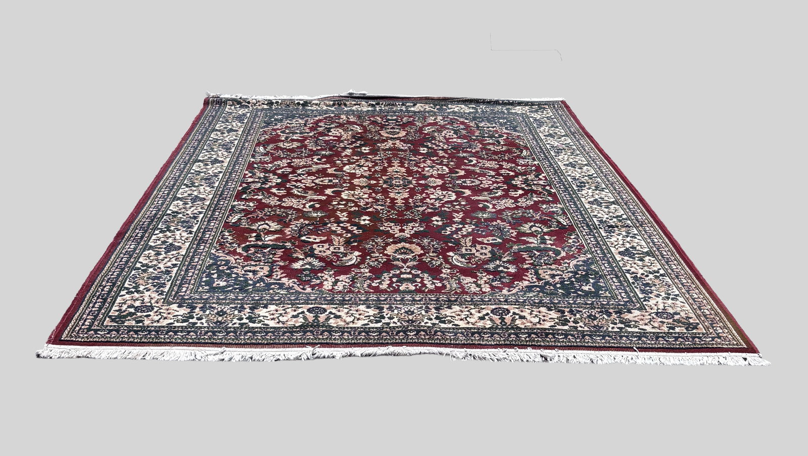 Belgium Certified DC Quality Red Floral Rug: The rug constructed from 100% heat-set polypropylene, designed with a traditional red floral with an intricate central medallion and classic patterned borders, the reverse with certified DC Quality ta