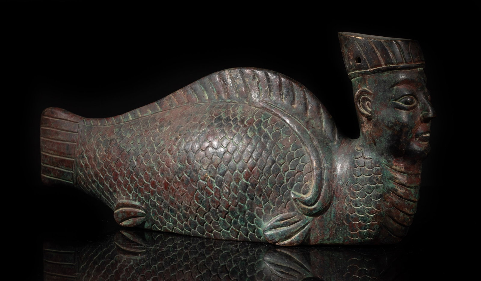 Estate Chinese Bronze Table Sculpture: Chinese bronze table sculpture with human head and fish body, the underside incised ancient characters. Approx. 14*5.8*3.5 inch. The Estate of the Thomas & Anna. Fung. Huntington Beach, CA, 2016.