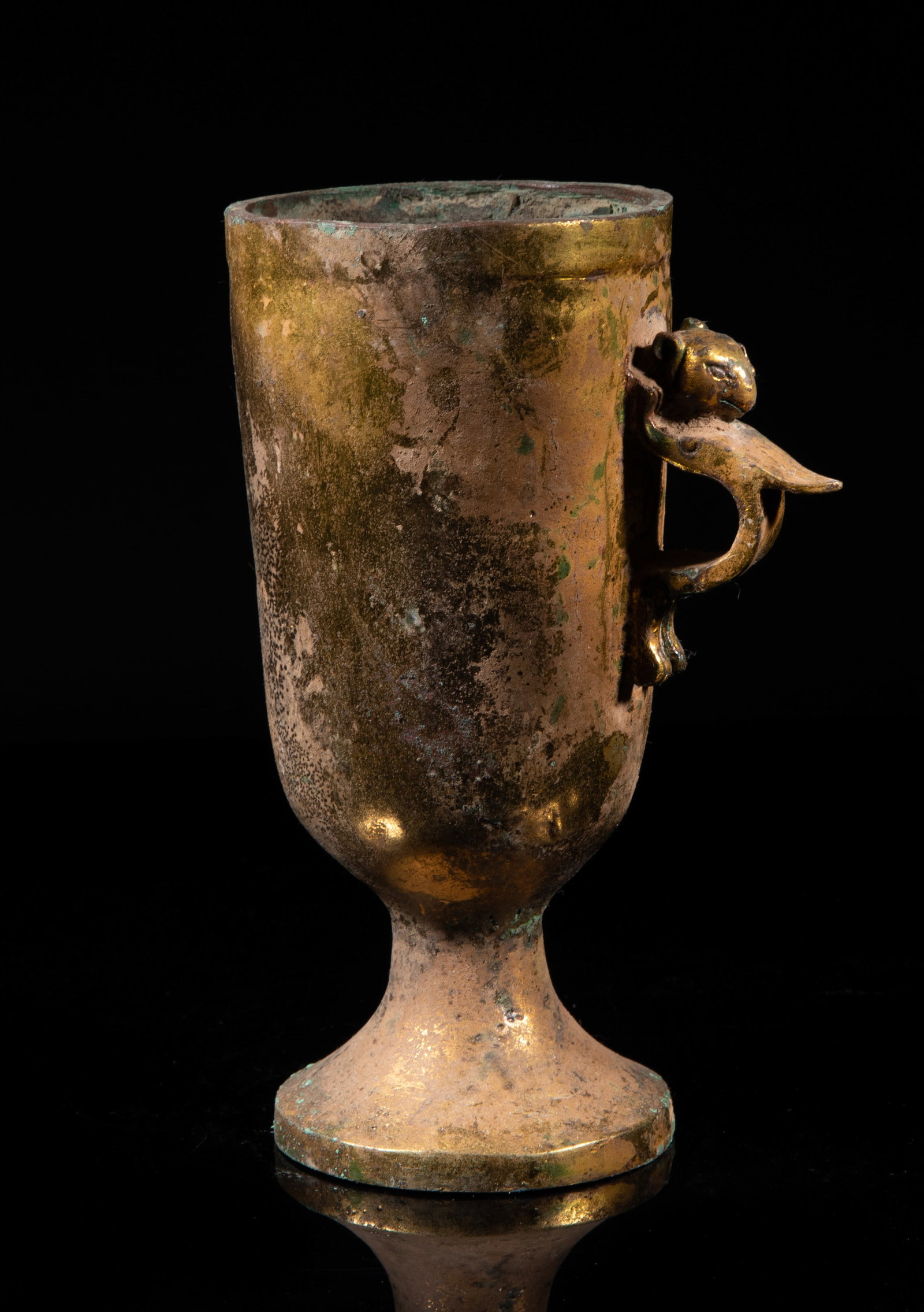 Estate Chinese Gilt Bronze Tall Cup: Of deep U-shape with a spreading foot, cast with stylized beast form handle. Approx. 7.2*4.7*3.2 inch. The Estate of the Robert. H. Mitsui, Huntington Beach.