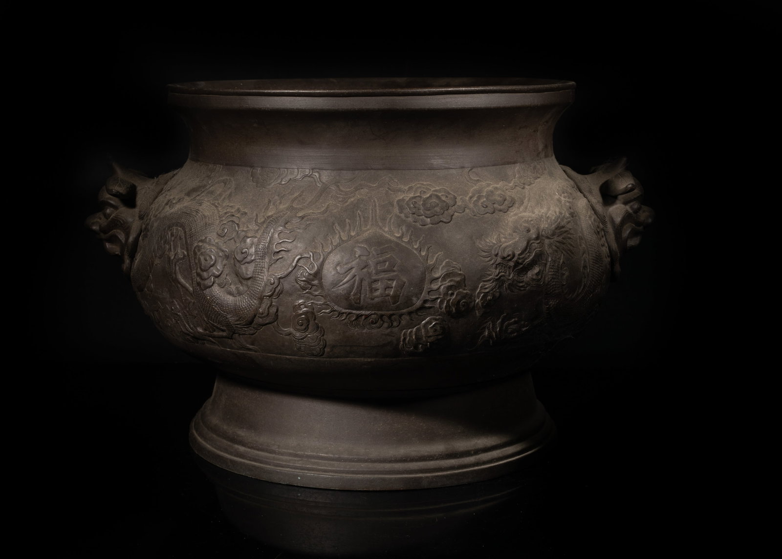 Large Antique Chinese Temple Used Bronze Censer: Large Chinese temple used bronze censer carved with dragons, with two mask handles. Approx. 16*13*10.5 inch. The Estate of the Store Closed Sale, Pasadena, CA. 2025.