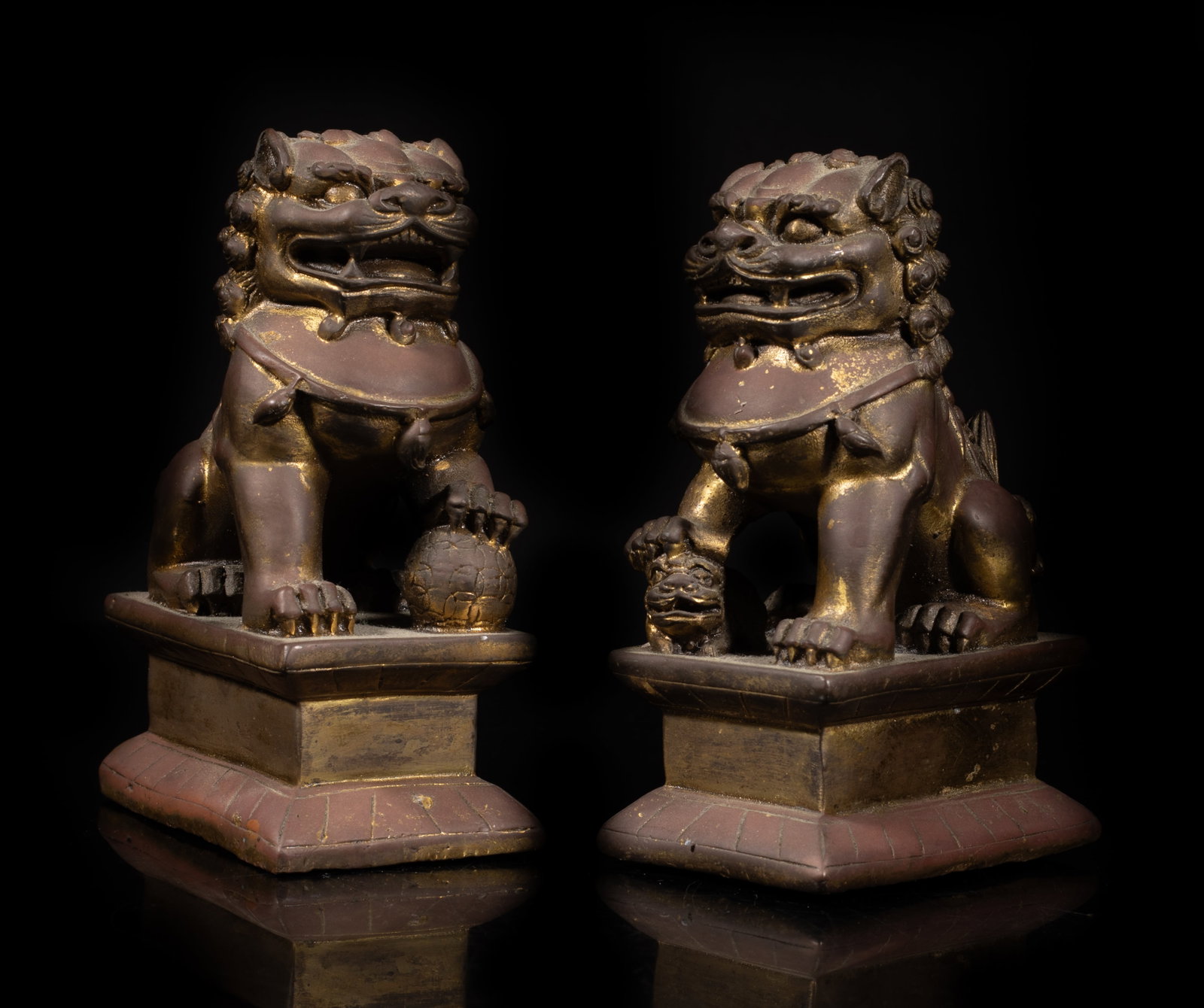 Two Antique Chinese Gilt Bronze Sculptures: Two Chinese gilt bronze foo dog sculptures. Approx. 4.3*2.7*1.8 inch (larger).