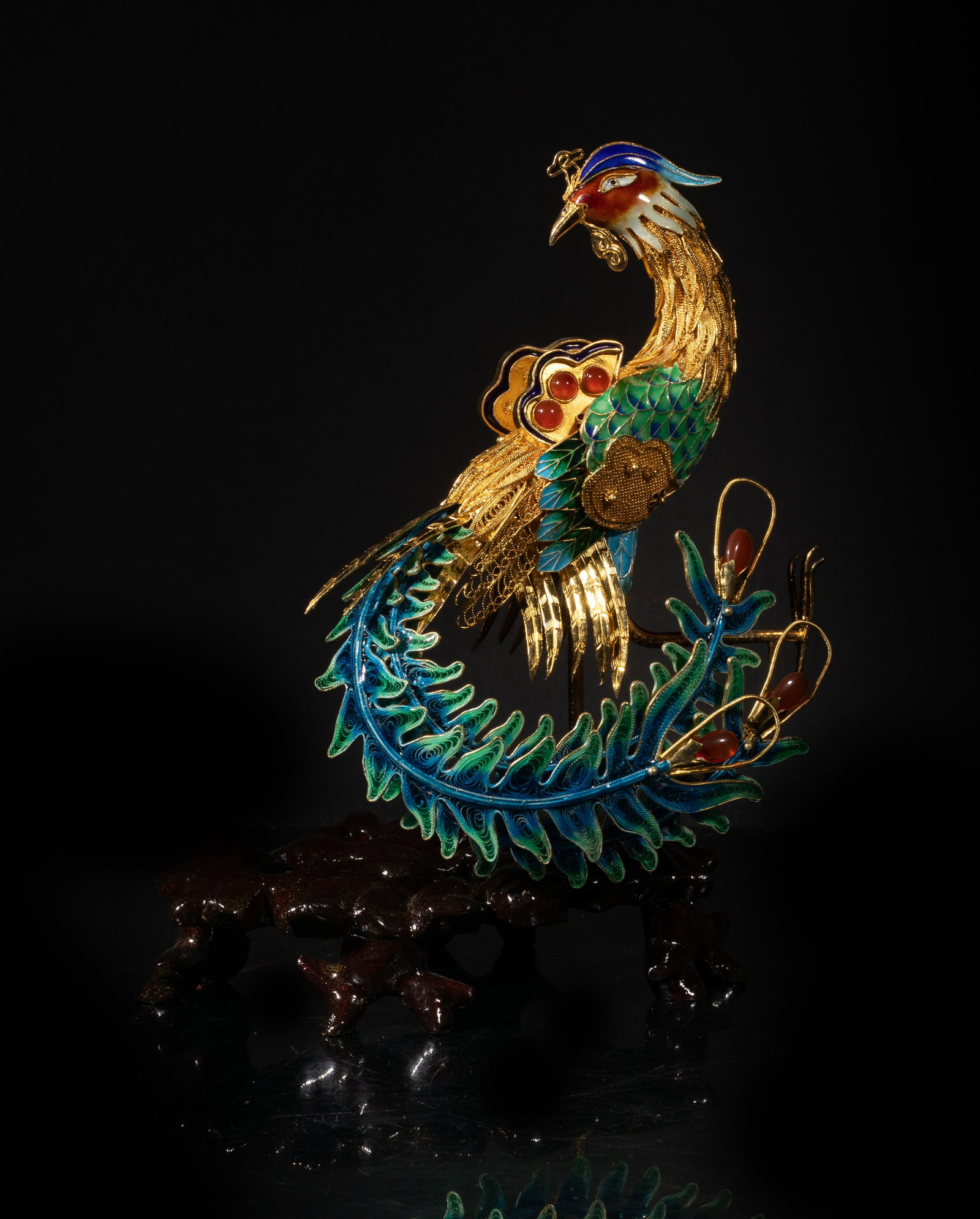 Chinese Enameled Gold on Silver Sculpture Phoenix: Chinese enameled gold on silver sculpture, in the form of the phoenix. Approx. 7.5*5.6 inch; 271g (with stand)