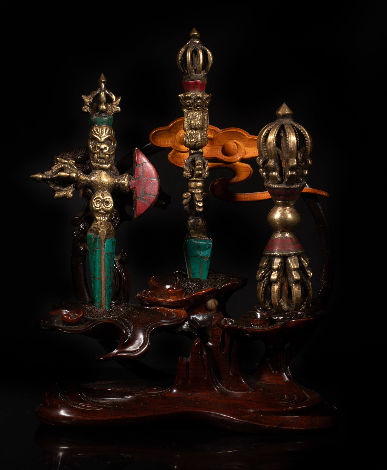 Set Chinese Sino-Tibetan Bronze Tools: Set of three Chinese Sino-Tibetan bronze cast vajra sculptures, with matched wood base. Approx. 8.4*6.3*2.9 inch (w/ base).