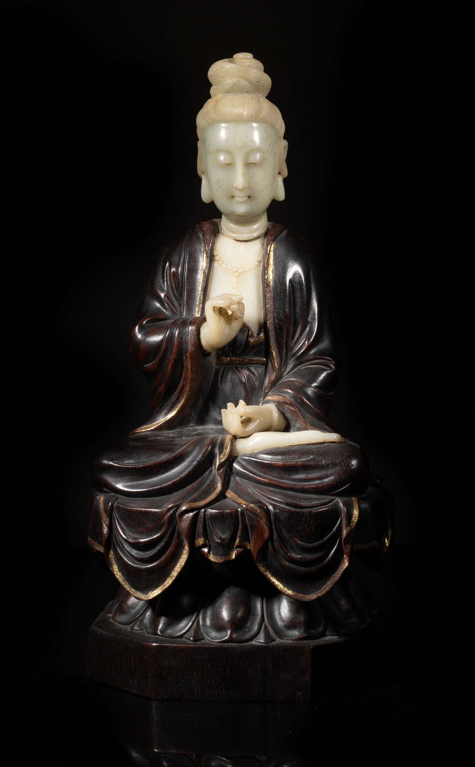 Early 1900s Chinese Zitan Wood, Stone Buddha: Heavy Chinese Zitan wood and stone carved sculpture of Buddha seated on lotus base. Approx. 13.2*6.5*5.5 inch.