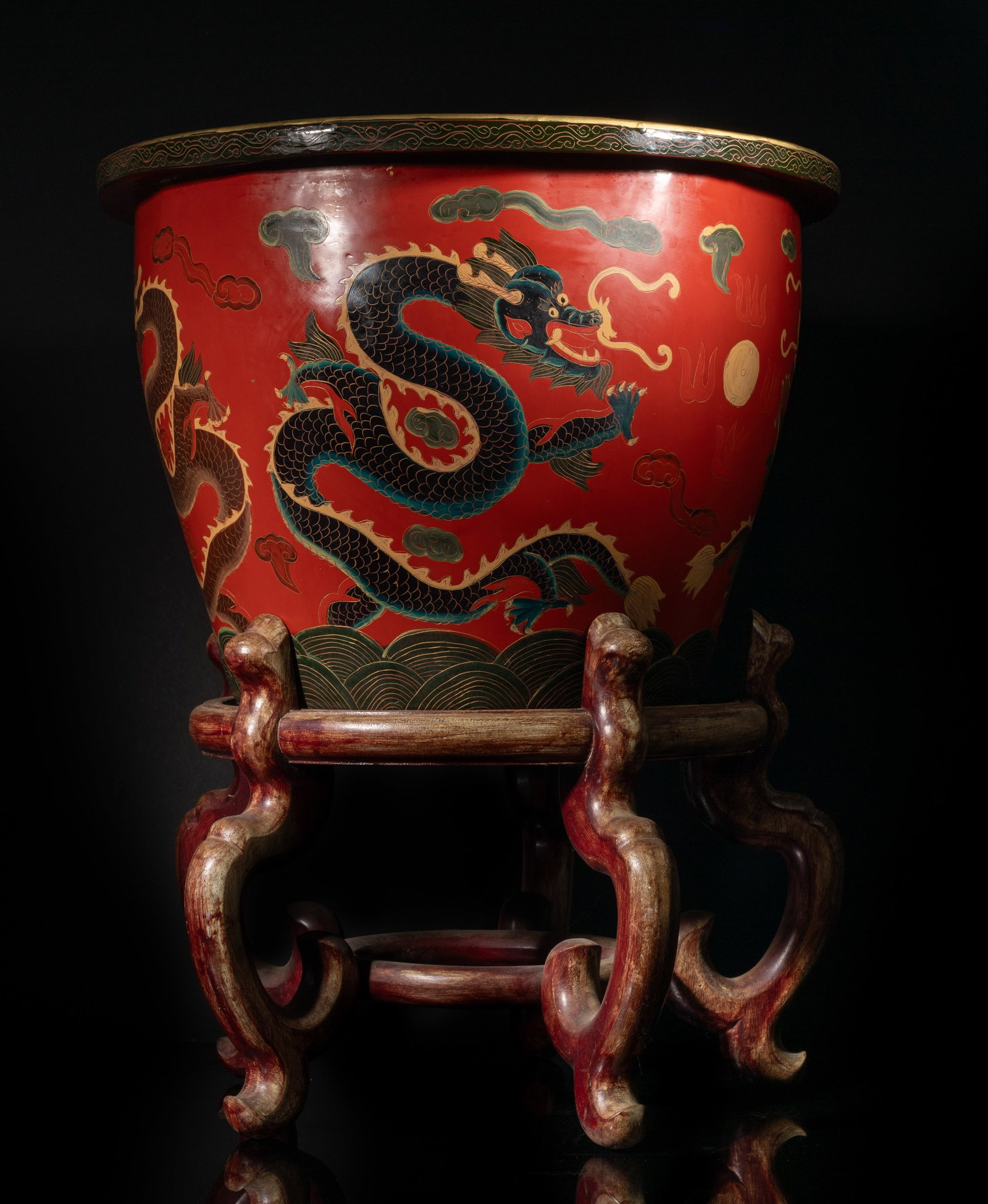 Large Chinese Antique Dragon Lacquer Pot W/Stand: The pot applied overall in red color, highlight with sinuous dragon amongst pearl and clouds, come with a fitted wood stand. Approx. 17.5*21.8 inch (w/stand)