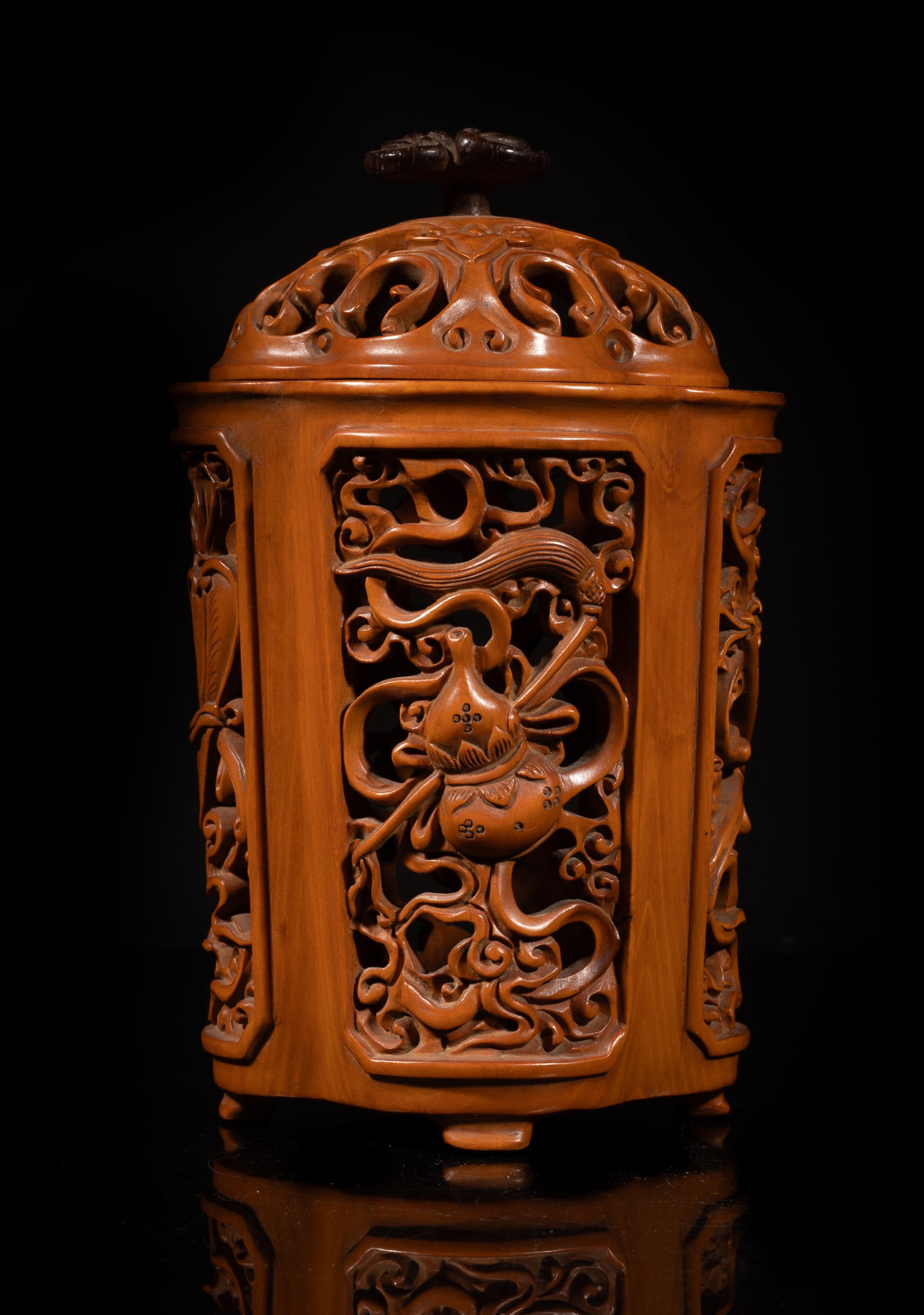 Antique Chinese Boxwood Covered Pot: Chinese boxwood covered pot carved in openwork with traditional symbols. Approx. 6.7*4.2*3.7 inch. The Estate of the Mark Oliver. Los Angeles. 1998.