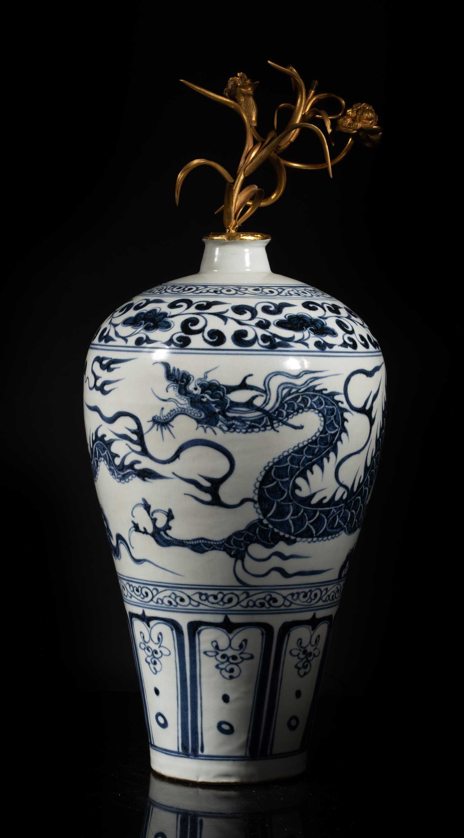 Estate Chinese Export Porcelain Dragon Vase: Tall Chinese blue and white porcelain dragon vase, with metal flower sculpture on the mouth. Approx. 17.5*7 inch. The Estate of the Thomas & Anna. Fung. Huntington Beach, CA, 2016.